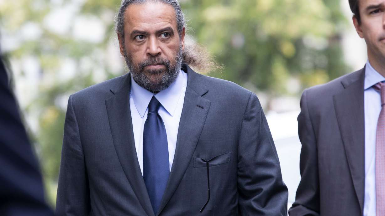 FILE - Sheikh Ahmad al-Fahad al-Sabah arrives at a Geneva's courthouse ahead of the verdict for a trial for forgery in connection with arbitration, in Geneva, Switzerland, Friday, Sept. 10, 2021. The IOC has suspended former Olympic power broker Sheikh Ahmad of Kuwait for 15 years after his conviction for forgery was upheld on appeal this year at a Swiss criminal appeals court.