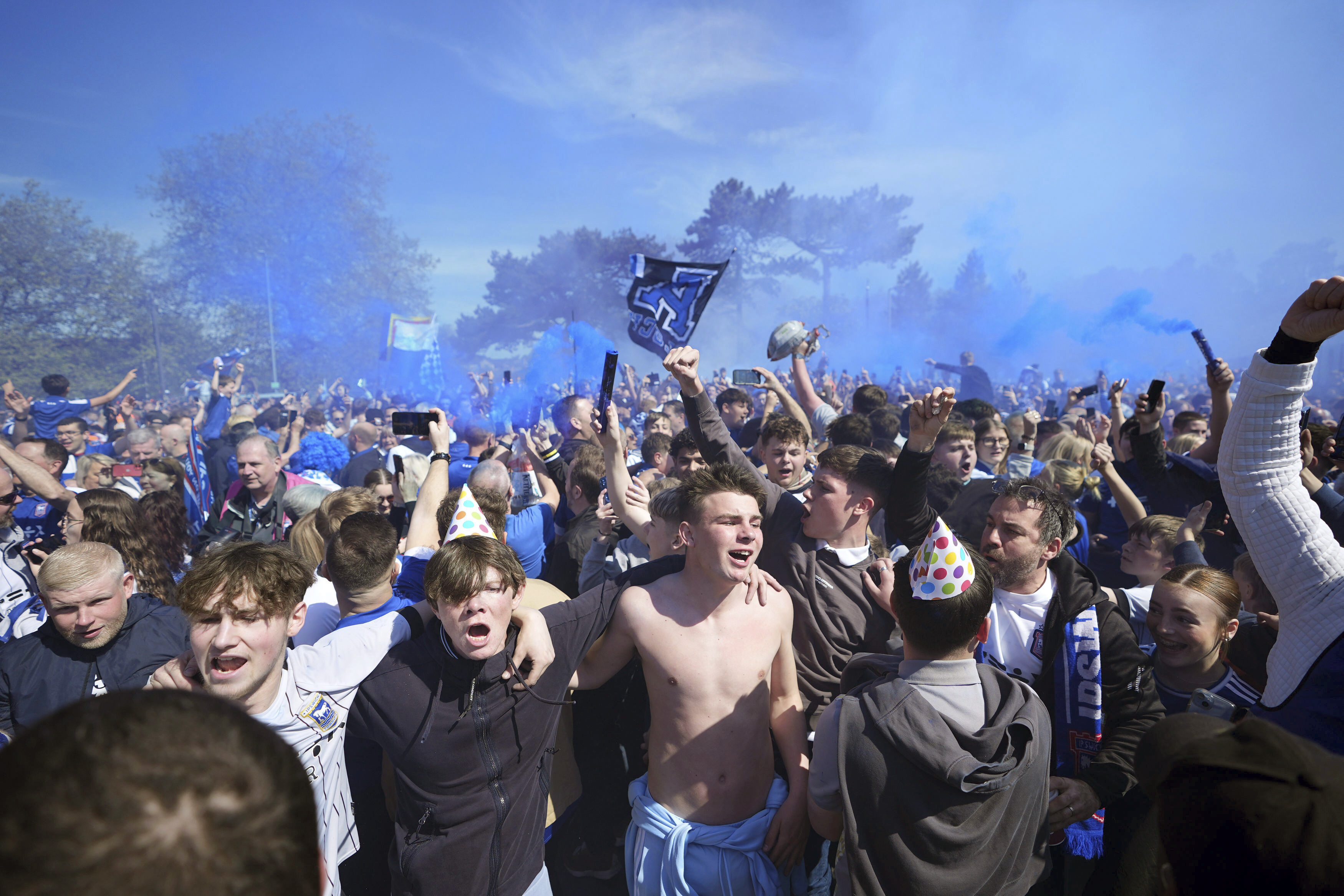 Ipswich Town fans react, ahead of the English Championship soccer match between Ipswich Town and Huddersfield Town at Portman Road, in Ipswich, Saturday, May 4, 2024.