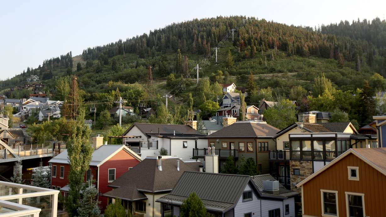 Treasure Hill rises behind homes in the Old Town neighborhood of Park City on Aug. 3, 2018, near where a proposed new mansion has been the source of continuing controversy.