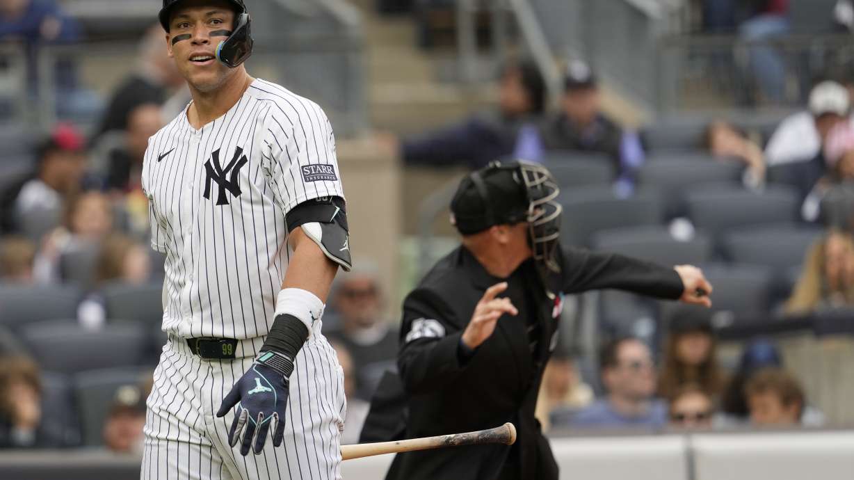Homeplate umpire Ryan Blakney, right, ejects New York Yankees' Aaron Judge, left, from the game in the seventh inning of a baseball game against the Detroit Tigers, Saturday, May 4, 2024, in New York.