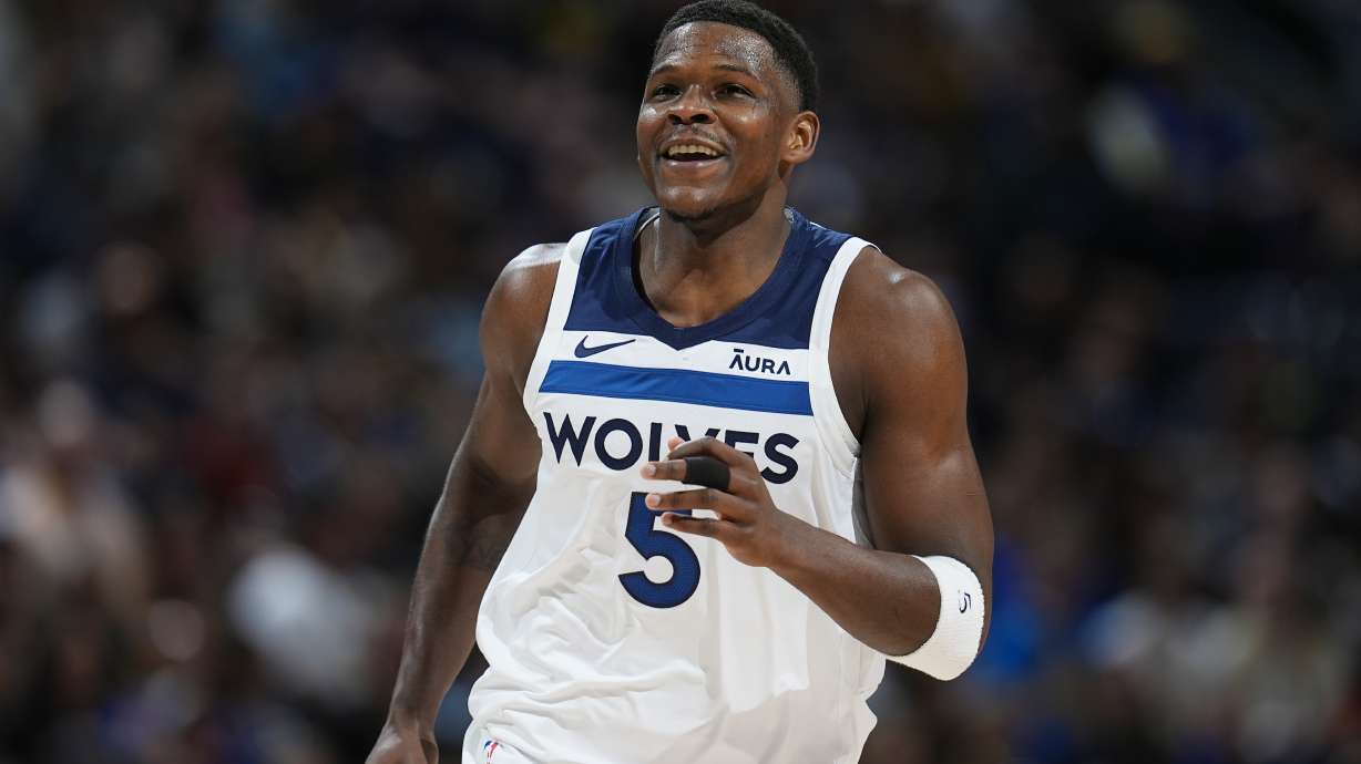 Minnesota Timberwolves guard Anthony Edwards reacts after hitting a basket in the first half of Game 1 of an NBA basketball second-round playoff series against the Denver Nuggets, Saturday, May 4, 2024, in Denver.