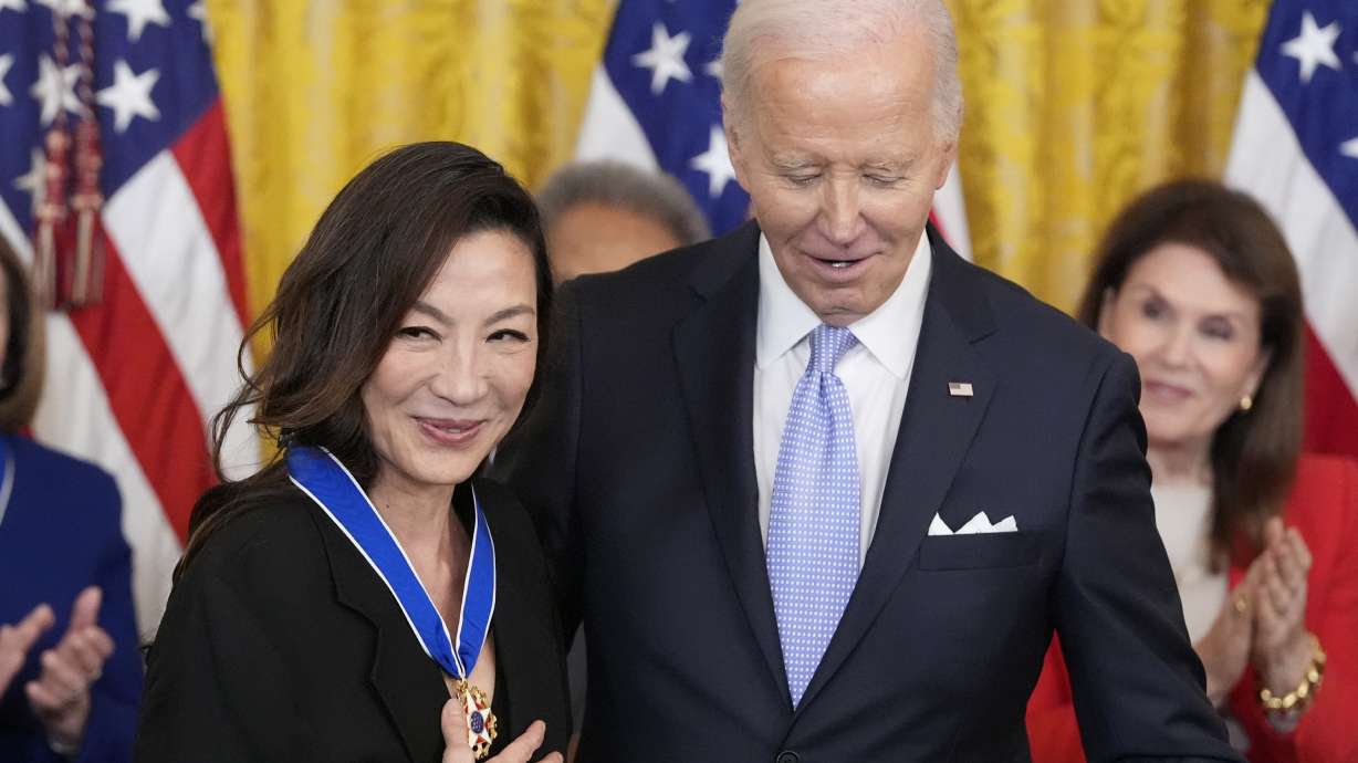 President Joe Biden awards the nation's highest civilian honor, the Presidential Medal of Freedom, to Michelle Yeoh during a ceremony in the East Room of the White House, Friday, May 3, 2024, in Washington.
