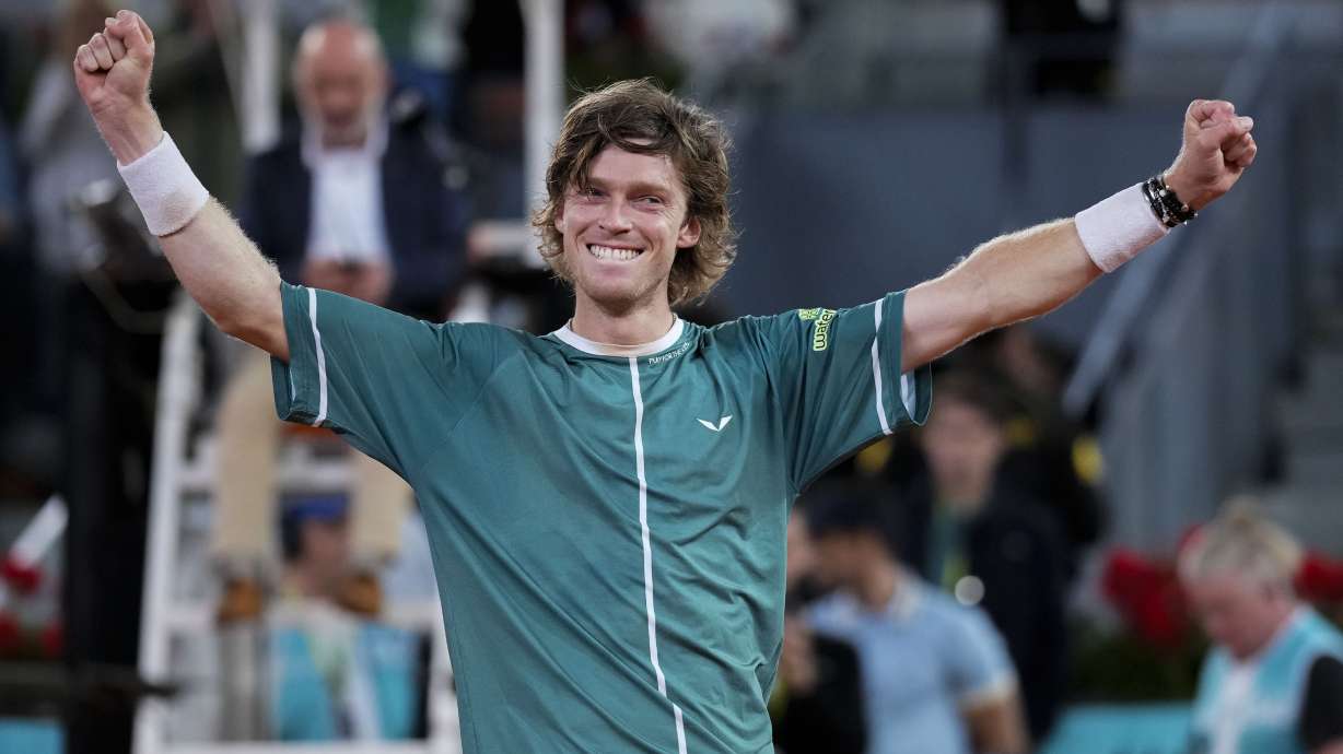 Andrey Rublev, of Russia, celebrates after winning the final match against Felix Auger-Aliassime, of Canada, at the Madrid Open tennis tournament in Madrid, Spain, Sunday, May 5, 2024.