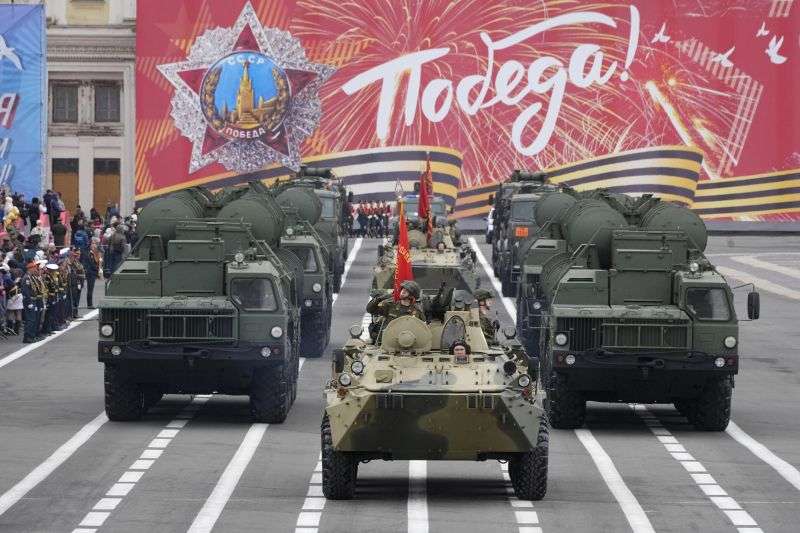 Russian S-400 anti-aircraft missile system launchers and APCs roll during a rehearsal for the Victory Day military parade at Dvortsovaya Square in St. Petersburg, Russia, Sunday.