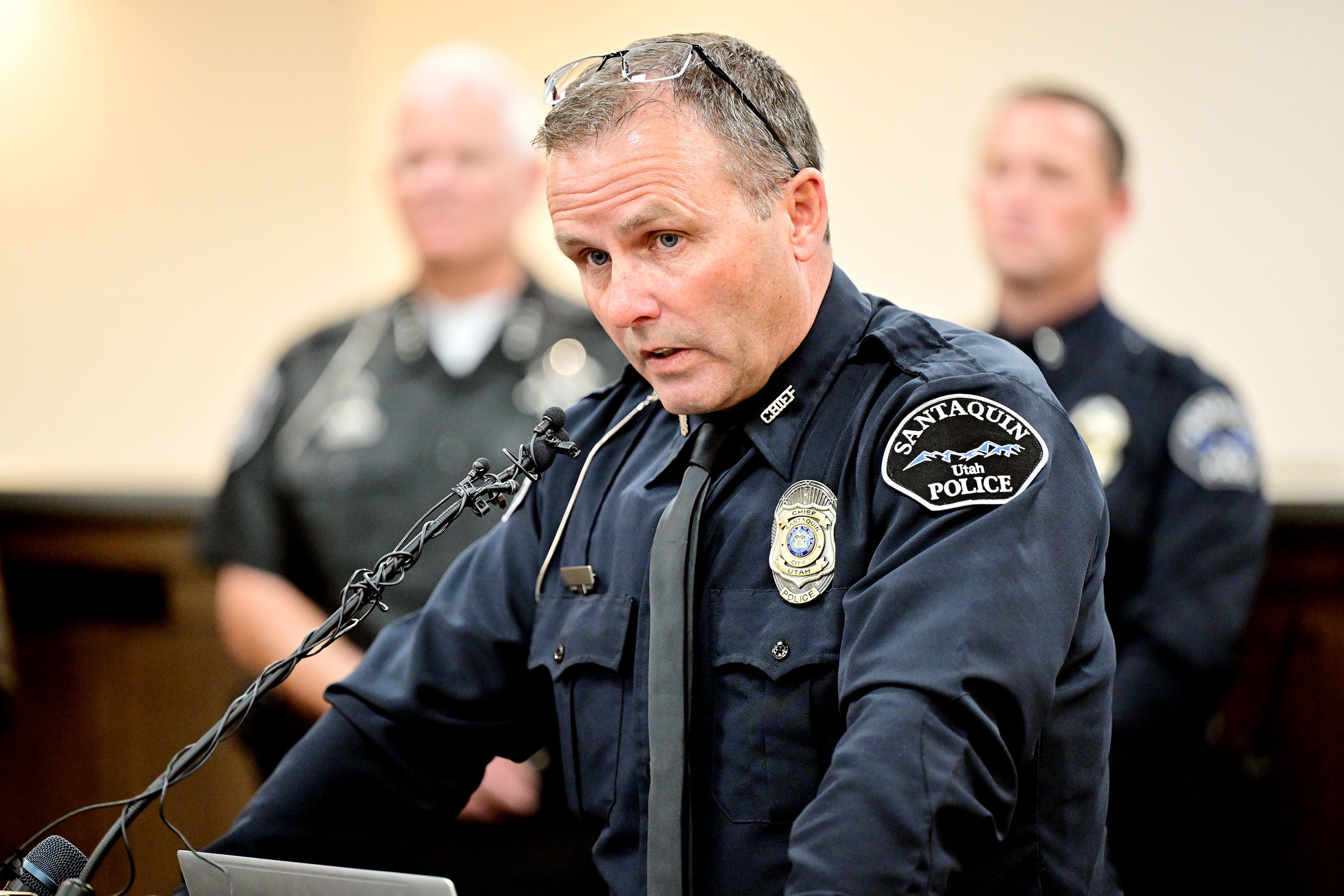 Santaquin Police Chief Rodney Hurst speaks at a short press conference after bringing fallen Sgt. Bill Hooser back to Santaquin on Monday.