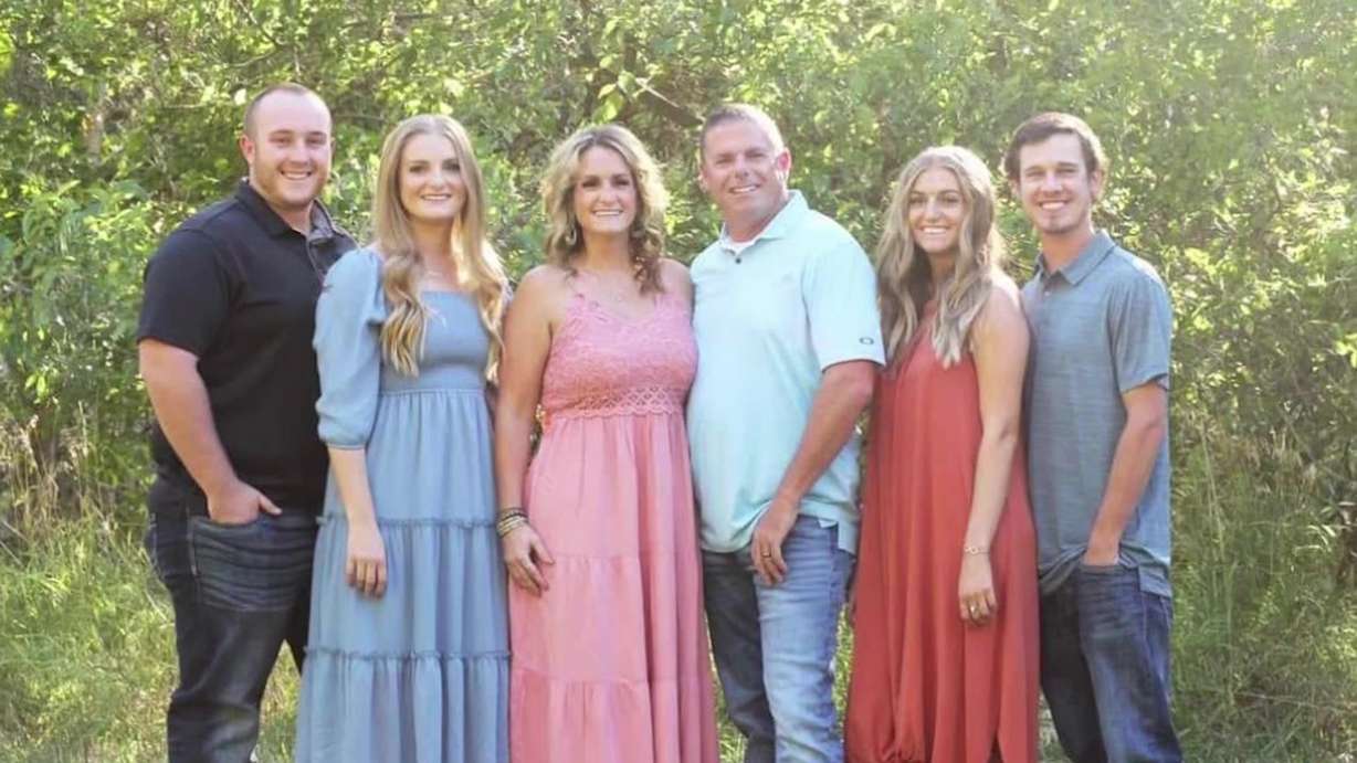 Sgt. Bill Hooser poses in a family photo. His family is calling him a hero, saying he died doing what he loved.