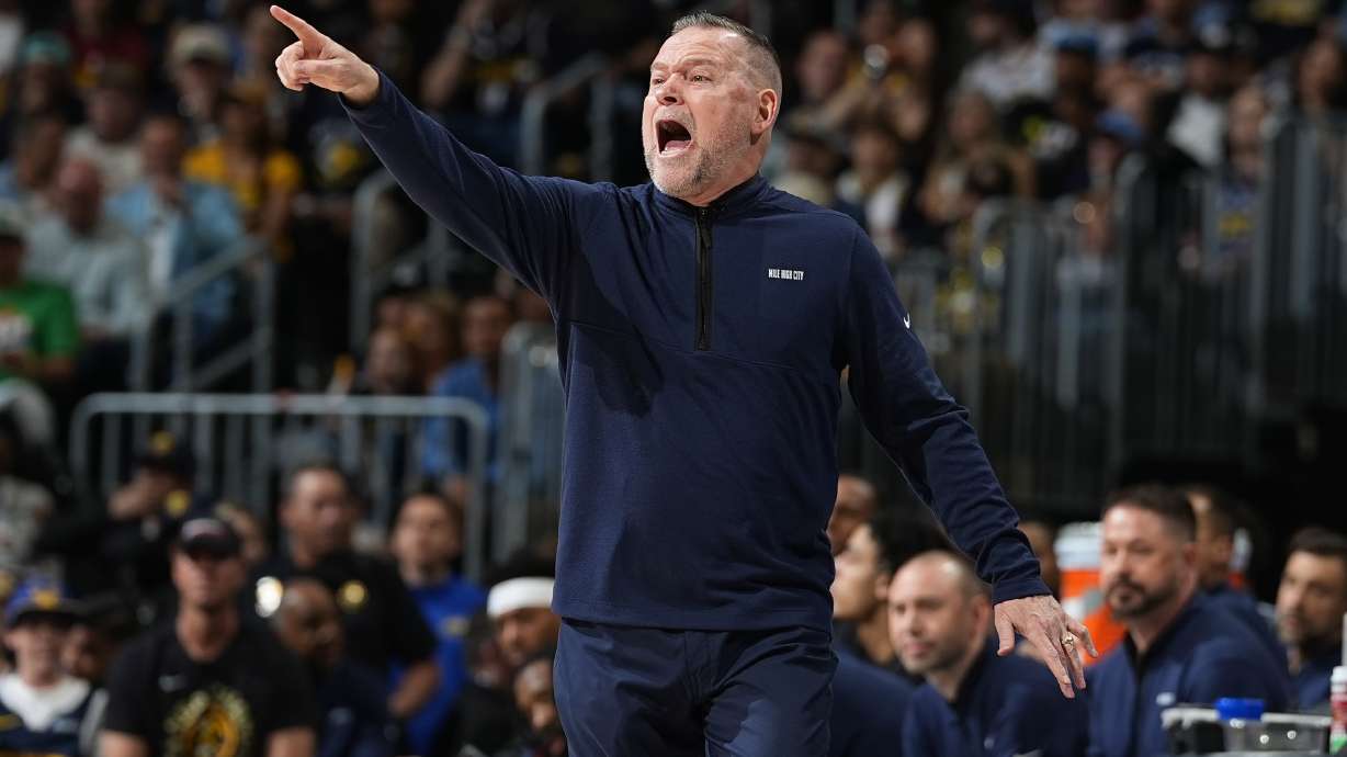 Denver Nuggets head coach Michael Malone directs his team in the first half of Game 1 of an NBA basketball second-round playoff series against the Minnesota Timberwolves Saturday, May 4, 2024, in Denver.