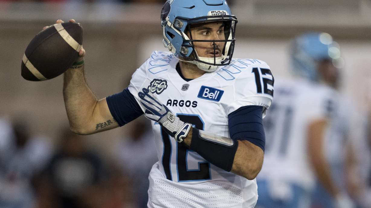 FILE - Toronto Argonauts quarterback Chad Kelly (12) throws against the Montreal Alouettes during the first half of a Canadian Football League game in Montreal, Friday, Sept. 15, 2023. The CFL suspended Toronto Argonauts quarterback Chad Kelly for at least nine regular-season games Tuesday, May 7, 2024, following its investigation into a lawsuit filed by a former strength and conditioning coach against both the player and club.