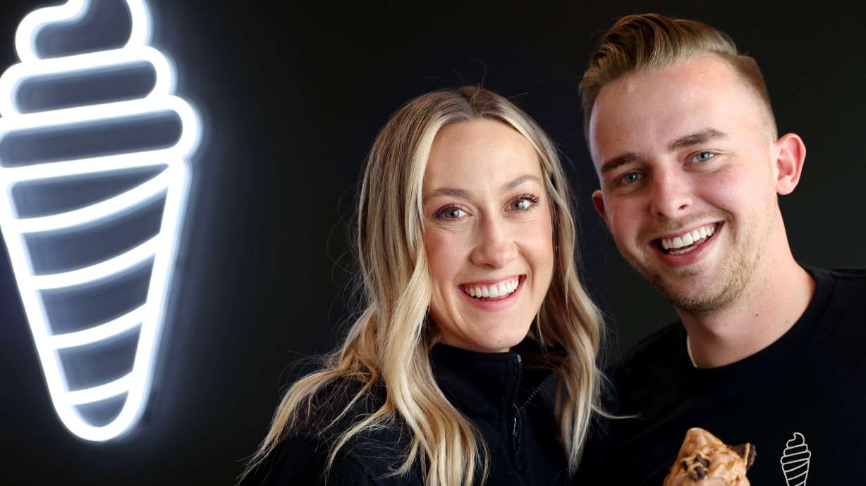 Kaitlyn and Jeremy Carlson, founders and owners of Crispy Cones, are photographed at Crispy Cones in Provo on April 19.