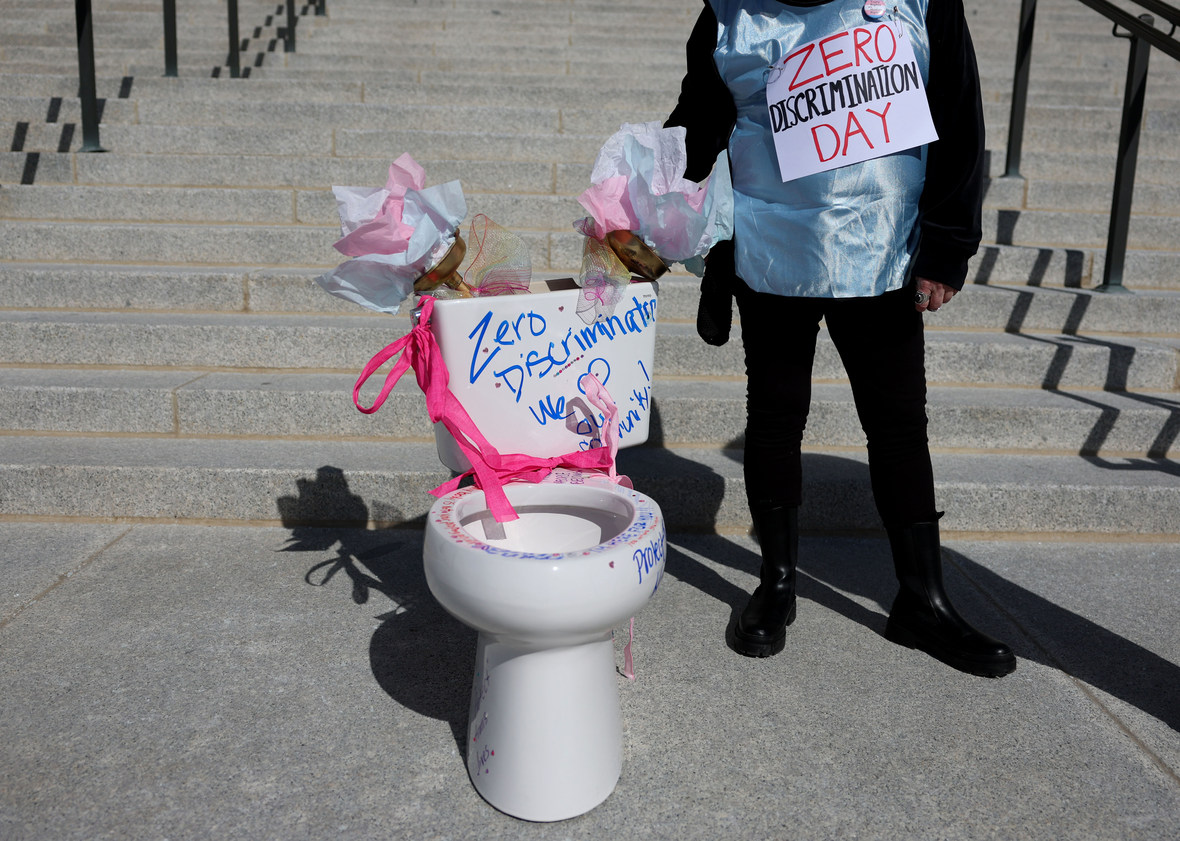 A toilet bowl placed on the stairs of the Capitol by members of Utah Students Unite during Zero Discrimination Day in Salt Lake City on March 1. The state auditor on Tuesday criticizing the Legislature for rushing through a bathroom bill earlier this year.