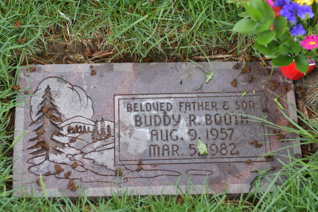 The grave marker for Buddy Booth at Elysian Gardens in Millcreek.