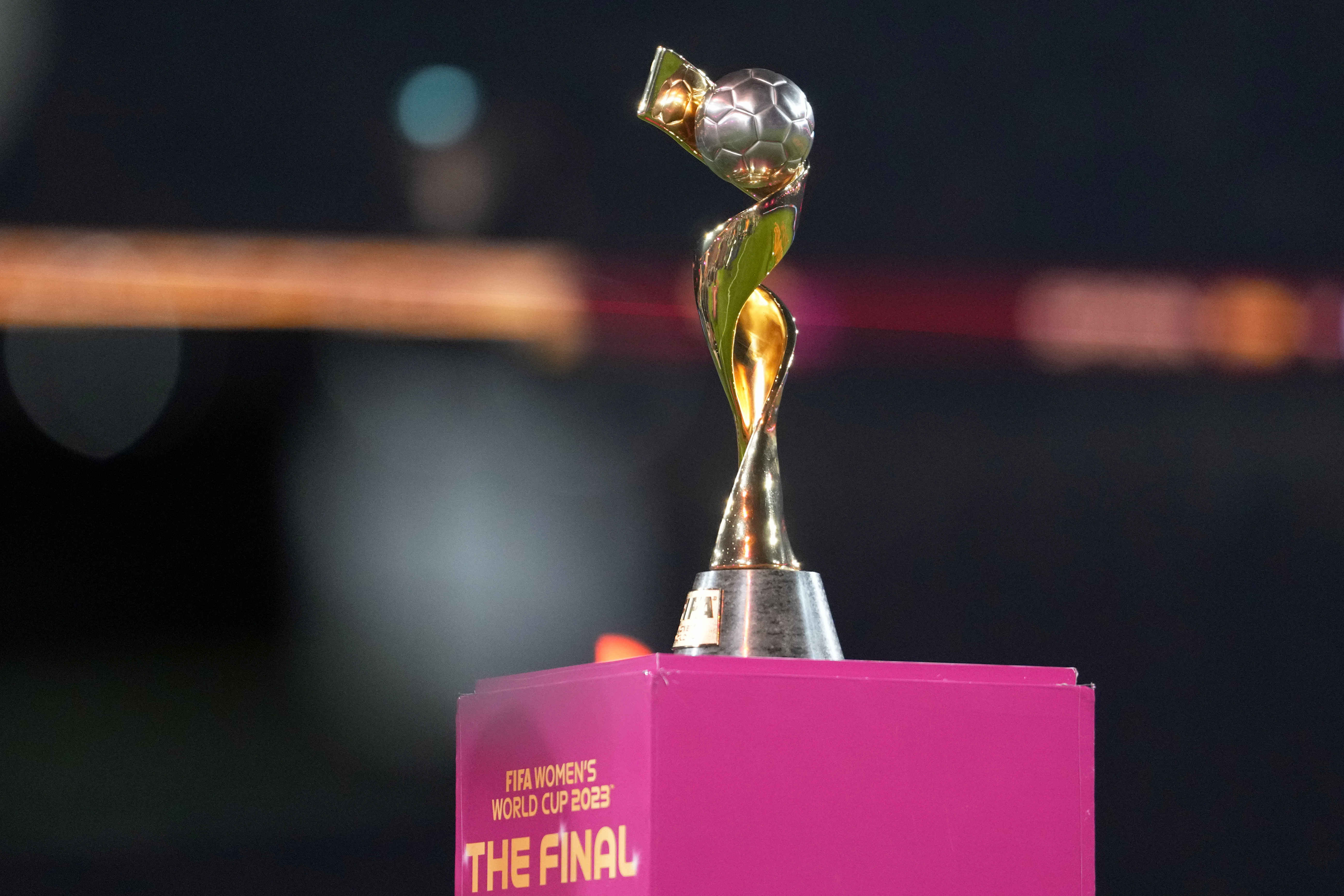 FILE - The tournament trophy is displayed on the pitch before the Women's World Cup soccer final between Spain and England at Stadium Australia in Sydney, Australia, on Aug. 20, 2023. Brazil's bid for the 2027 Women's World Cup was ranked higher than the bid submitted by Germany, the Netherlands and Belgium in an evaluation report released by FIFA on Tuesday, May 7, 2024.