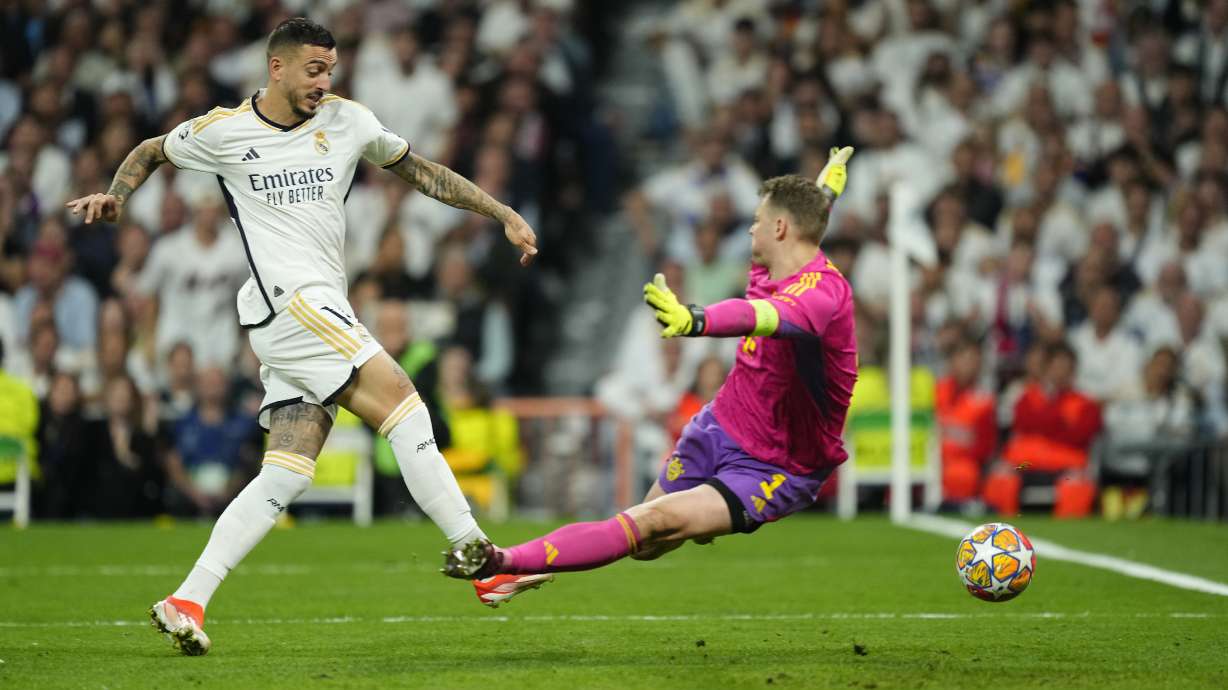 Real Madrid's Joselu scores his side's opening goal during the Champions League semifinal second leg soccer match between Real Madrid and Bayern Munich at the Santiago Bernabeu stadium in Madrid, Spain, Wednesday, May 8, 2024.