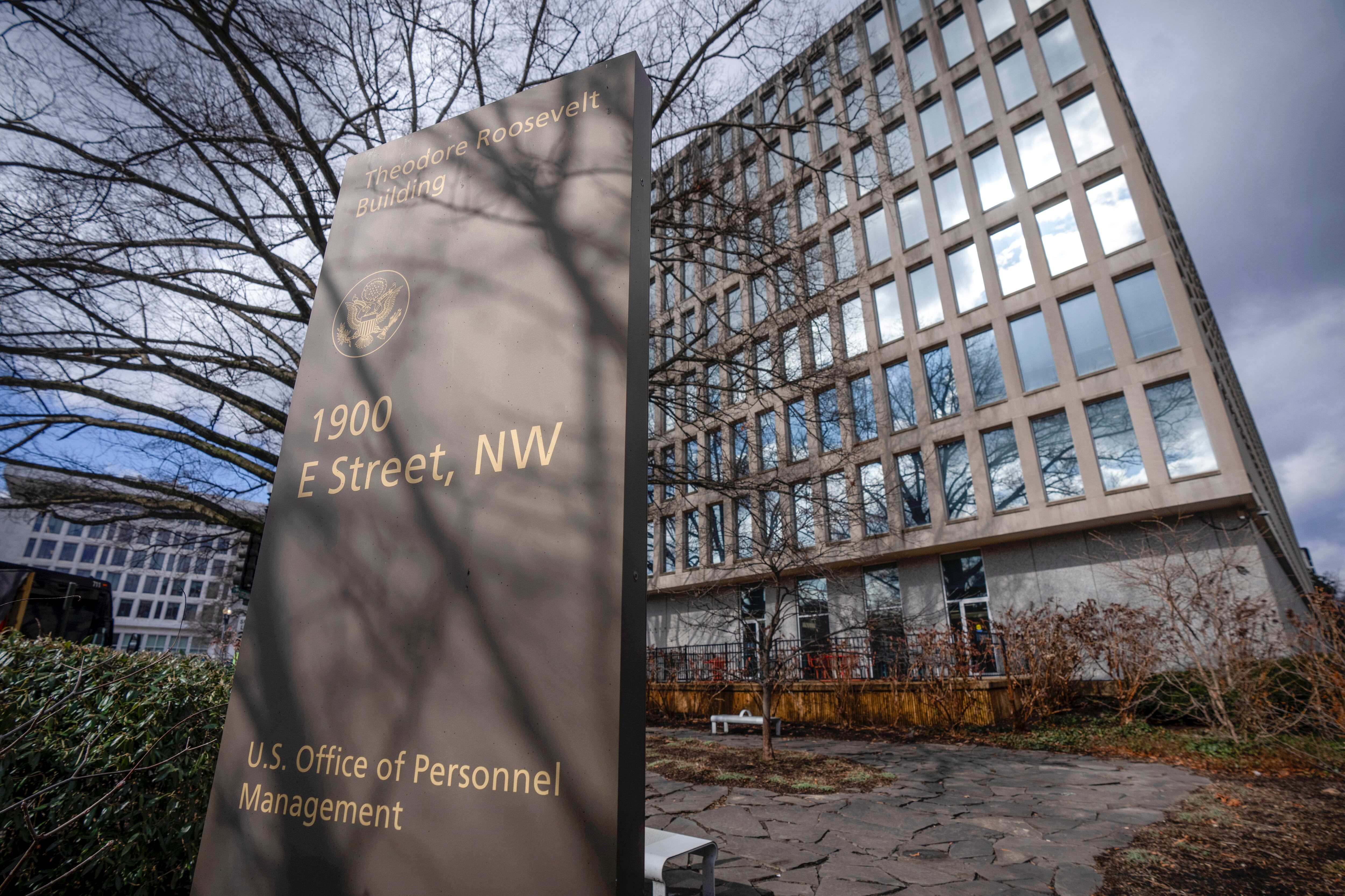 The Theodore Roosevelt Building, location of the U.S. Office of Personnel Management, is seen on Feb. 13, in Washington. Federal employees need to return to their offices, say Utah Sen. Mitt Romney.