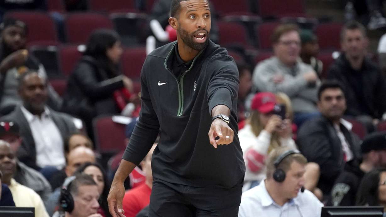 FILE - Then-Milwaukee Bucks associate head coach Charles Lee gestures during the first half of the team's NBA preseason basketball game against the Chicago Bulls on Tuesday, Oct. 11, 2022, in Chicago. The Charlotte Hornets have named Charles Lee as their next head coach. The 39-year-old Lee joins the Hornets after serving as the Boston Celtics top assistant coach. Lee will complete the Celtics’ playoff run before joining the Hornets on a full-time basis.