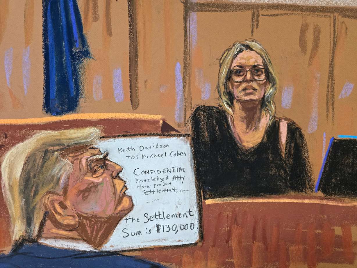 Former president Donald Trump watches as Stormy Daniels is questioned by prosecutor Susan Hoffinger during Trump's criminal trial on charges that he falsified business records, in Manhattan state court in New York City, Tuesday in this courtroom sketch.