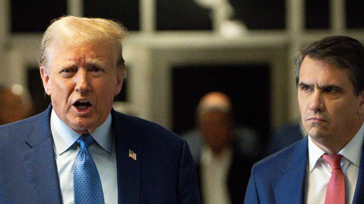 Former President Donald Trump speaks to members of the media at Manhattan Criminal Court, Thursday in New York City.