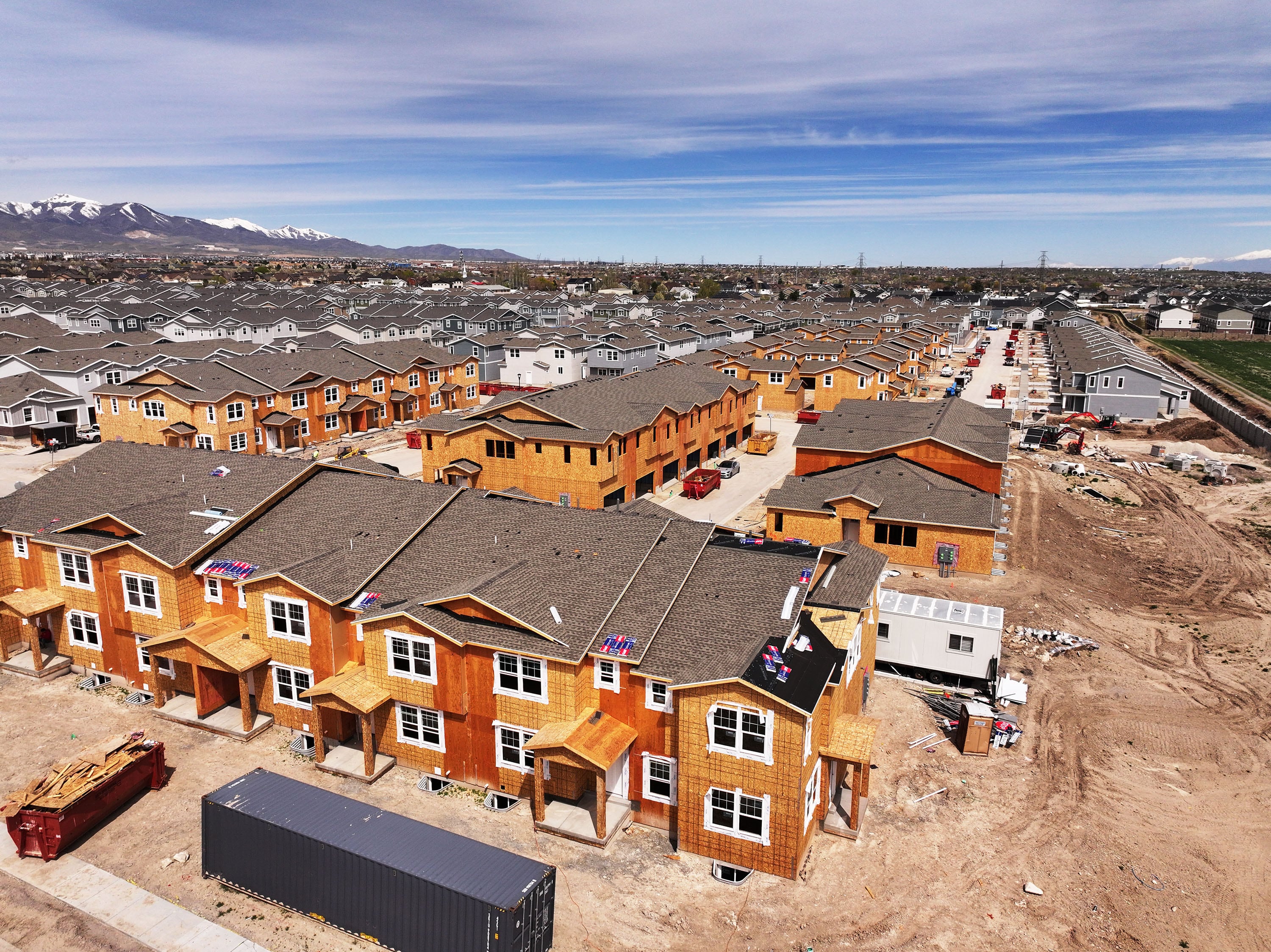 Construction continues in the Salt Lake Valley, with new homes, commercial buildings and property for sale on April 19. Average U.S. mortgage rates have declined for the first time since late March.