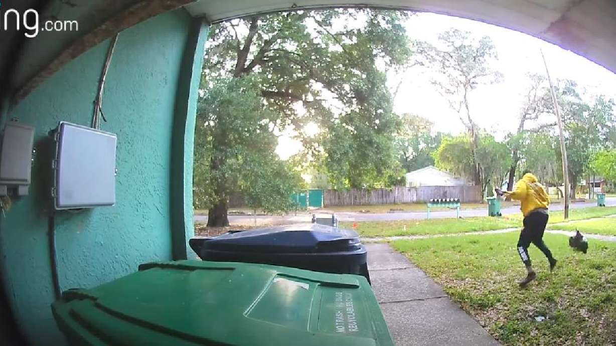 A man is chased by a bird in this doorbell camera video shared on YouTube April 22.