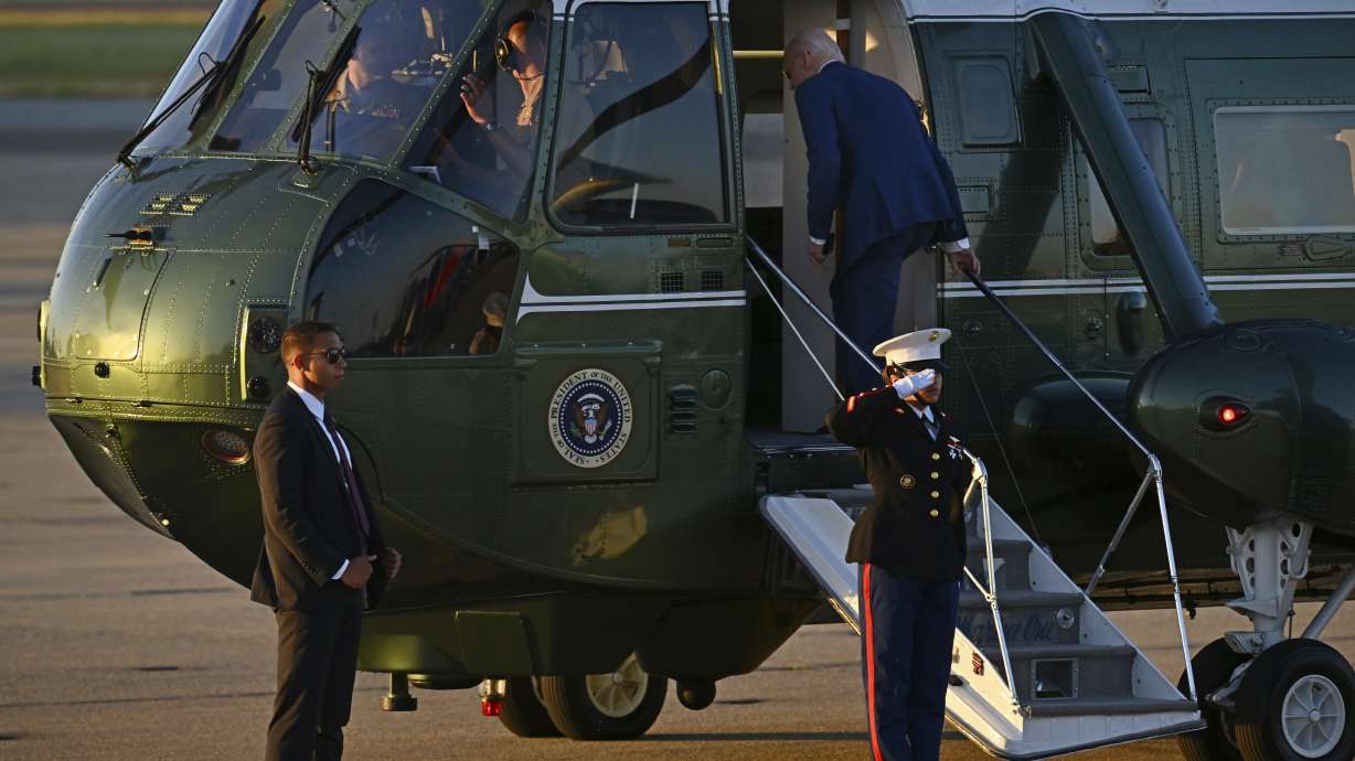 U.S. President Joe Biden boards Marine One at Moffett Airfield in Mountain View, Calif., Thursday.
