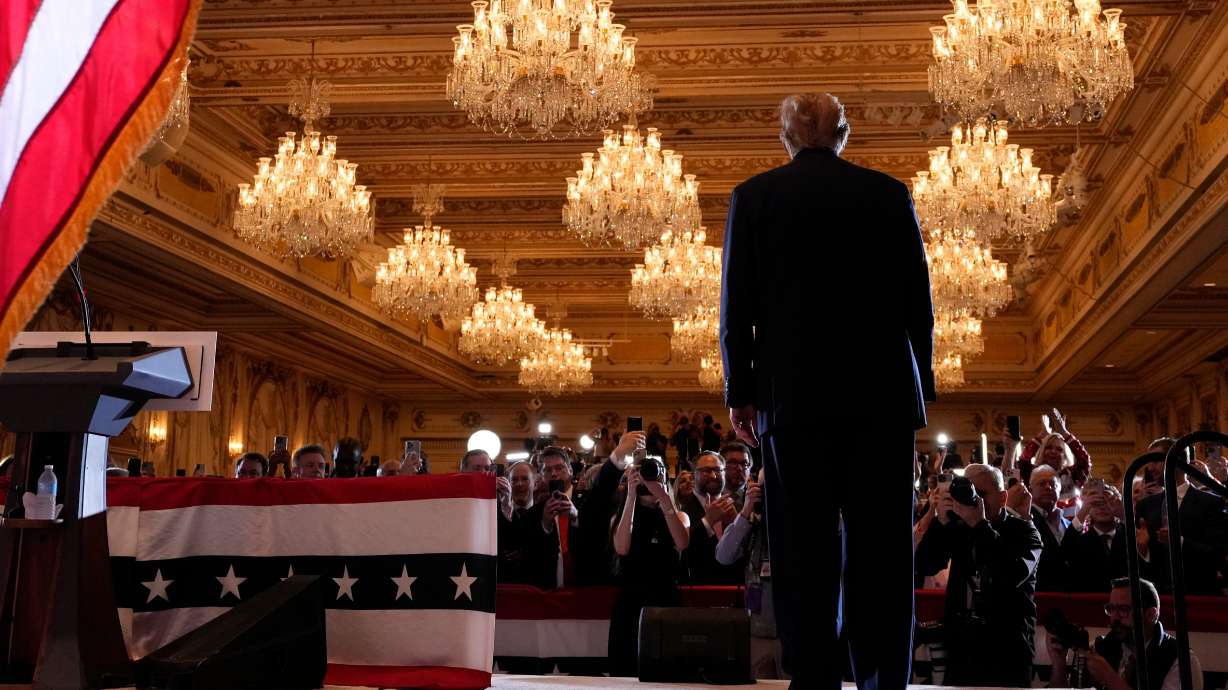 Republican presidential candidate former President Donald Trump arrives to speak at a Super Tuesday election night party on March 5 at Mar-a-Lago in Palm Beach, Fla. Trump endorsed Trent Staggs to replace Sen. Mitt Romney.