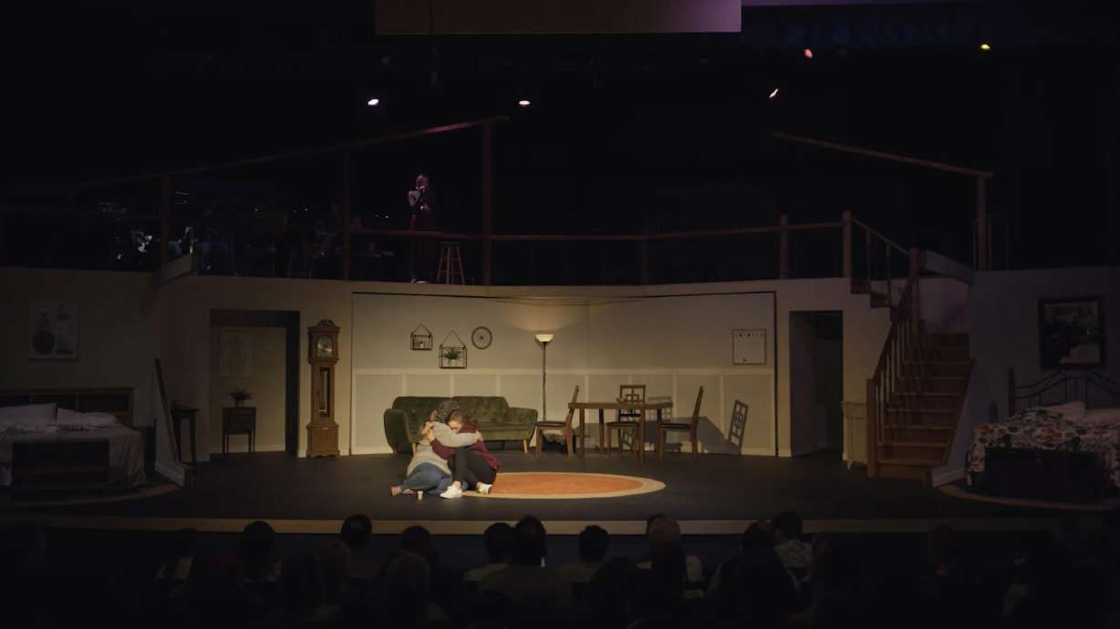 Actresses Liz Golden and Leah Carr hug onstage during a performance of "Relative Space" on June 22, 2023. More than a year later, the musical will debut in London.