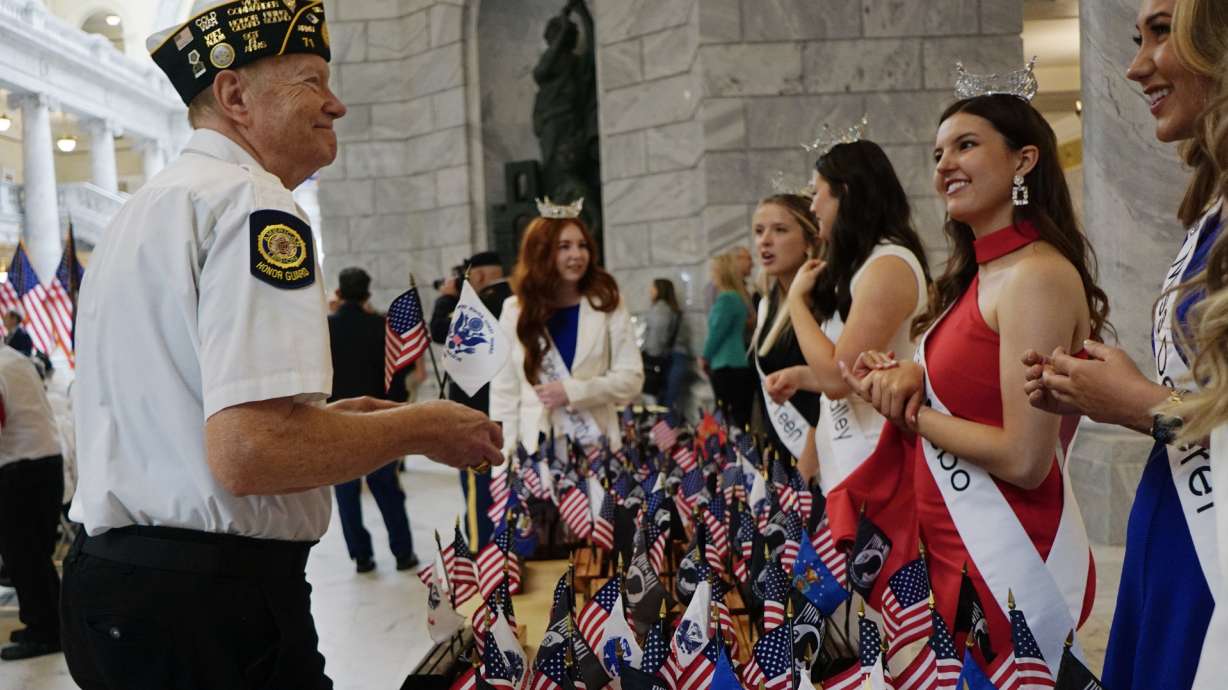 Honor guard veterans collect their awards at the state Capitol in Salt Lake City Friday, for providing military honors to families of fallen vets at funerals across the state.