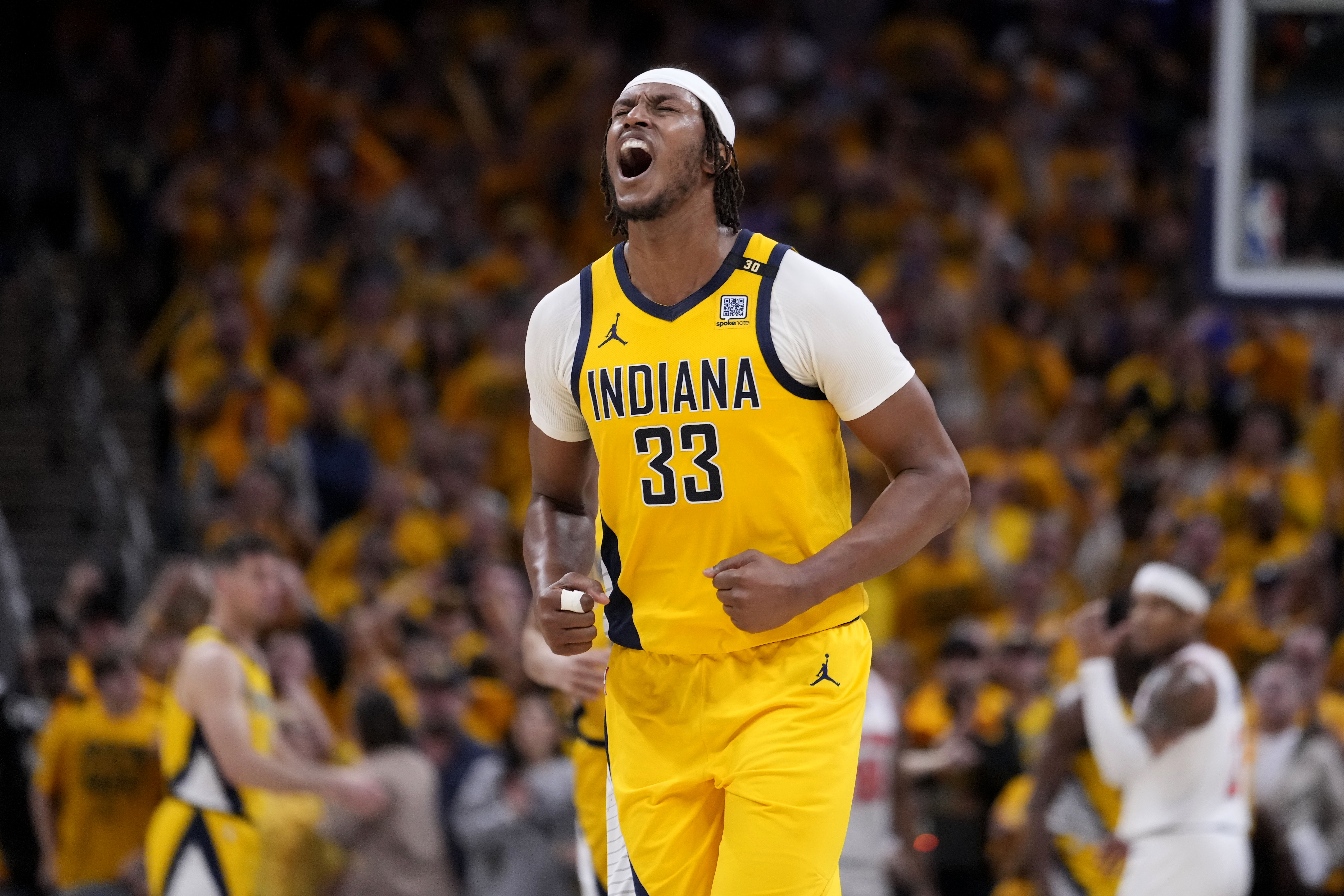 Indiana Pacers center Myles Turner celebrates at the end of Game 3 against the New York Knicks in an NBA basketball second-round playoff series, Friday, May 10, 2024, in Indianapolis. The Pacers won 111-106. 