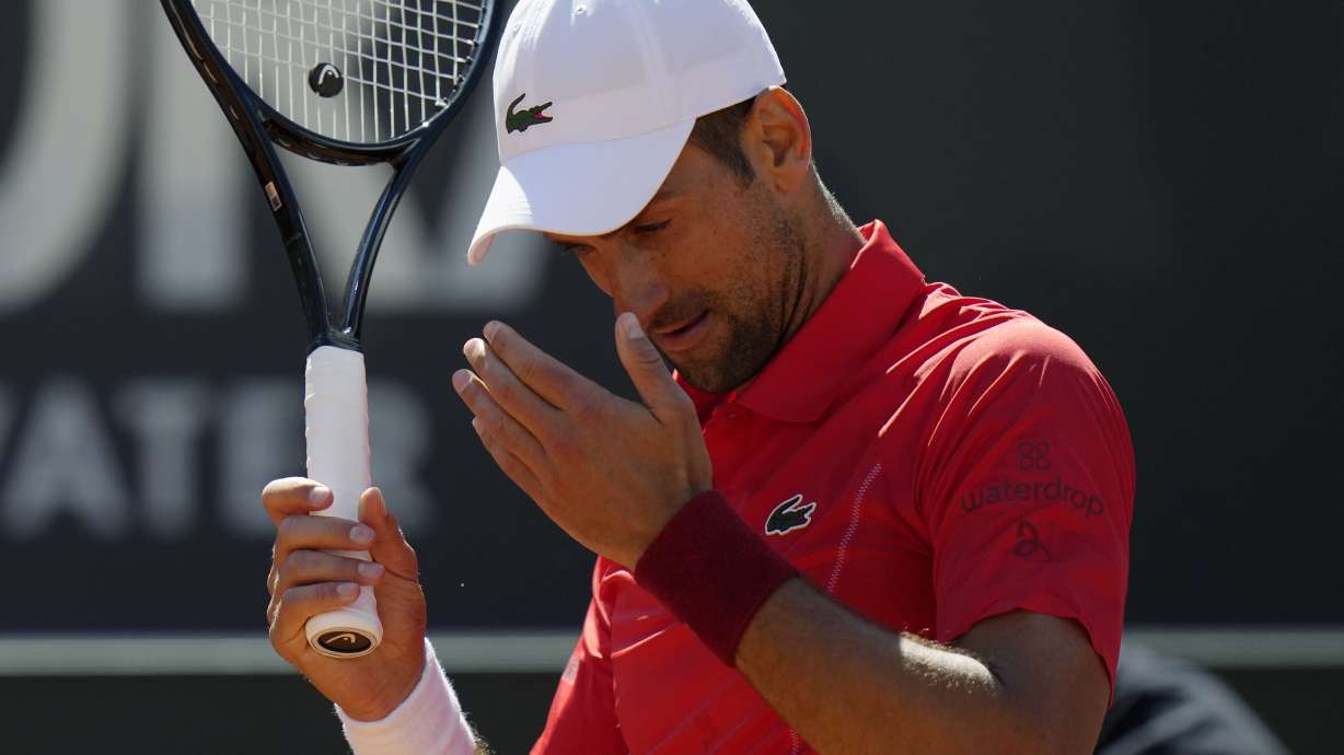 Serbia's Novak Djokovic reacts during a match against Chile's Alejandro Tabilo at the Italian Open tennis tournament in Rome, Sunday, May 12, 2024.