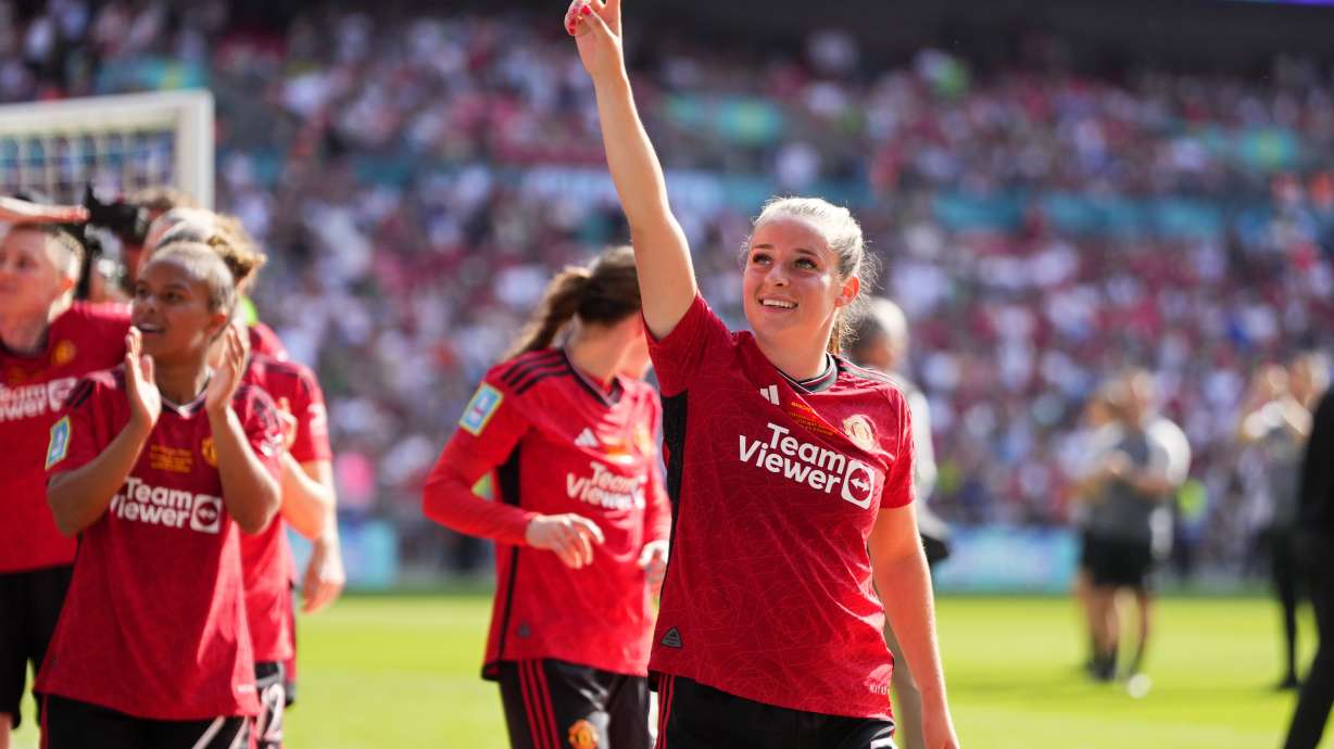 Manchester United's Ella Toone celebrates at the end of the Women's FA Cup final soccer match between Manchester United and Tottenham Hotspur at Wembley Stadium in London, Sunday, May 12, 2024. Manchester United won 4-0.