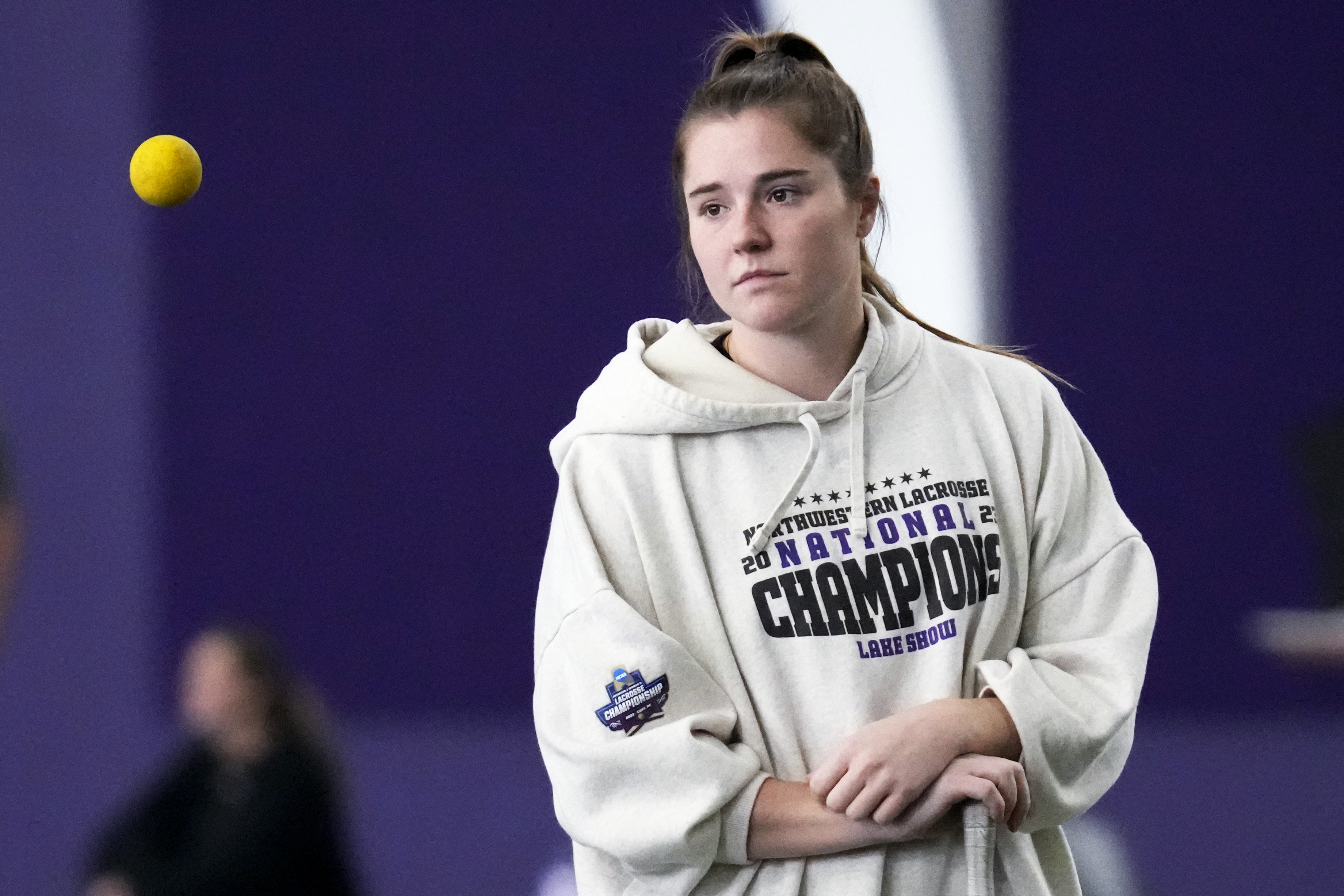 FILE - Northwestern lacrosse player Izzy Scane watches a ball during practice in Evanston, Ill., Feb. 6, 2024. Scane has broken the Division I record for women’s lacrosse goals. Scane scored her 359th career goal in 81 games in the first period against Denver in the NCAA Tournament. 