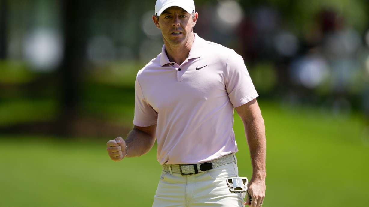 Rory McIlroy, of Northern Ireland, celebrates after a par on the third hole during the final round of the Wells Fargo Championship golf tournament at the Quail Hollow Club Sunday, May 12, 2024, in Charlotte, N.C.