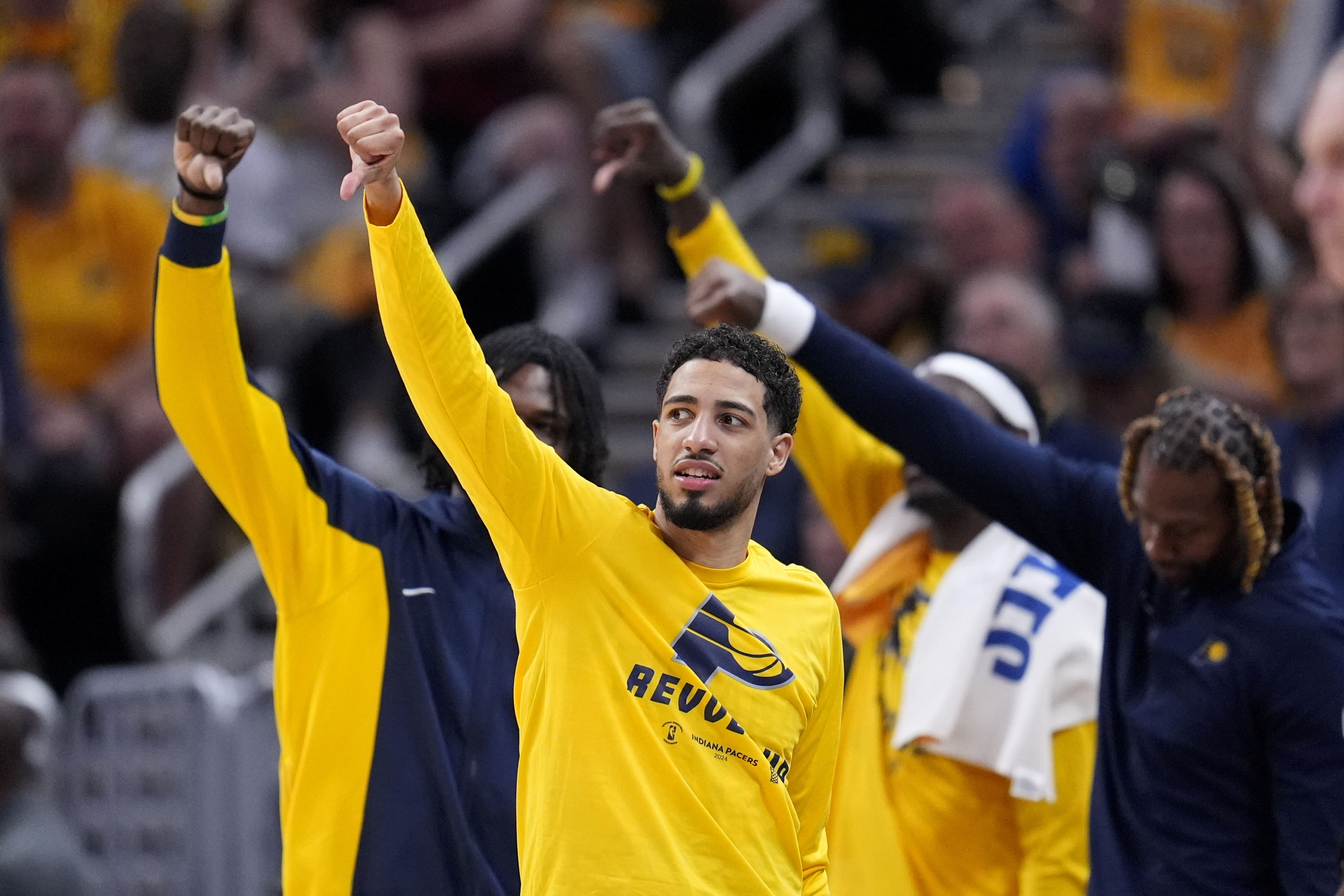 Indiana Pacers guard Tyrese Haliburton celebrates on the bench during the second half of Game 4 against the New York Knicks in an NBA basketball second-round playoff series, Sunday, May 12, 2024, in Indianapolis. 