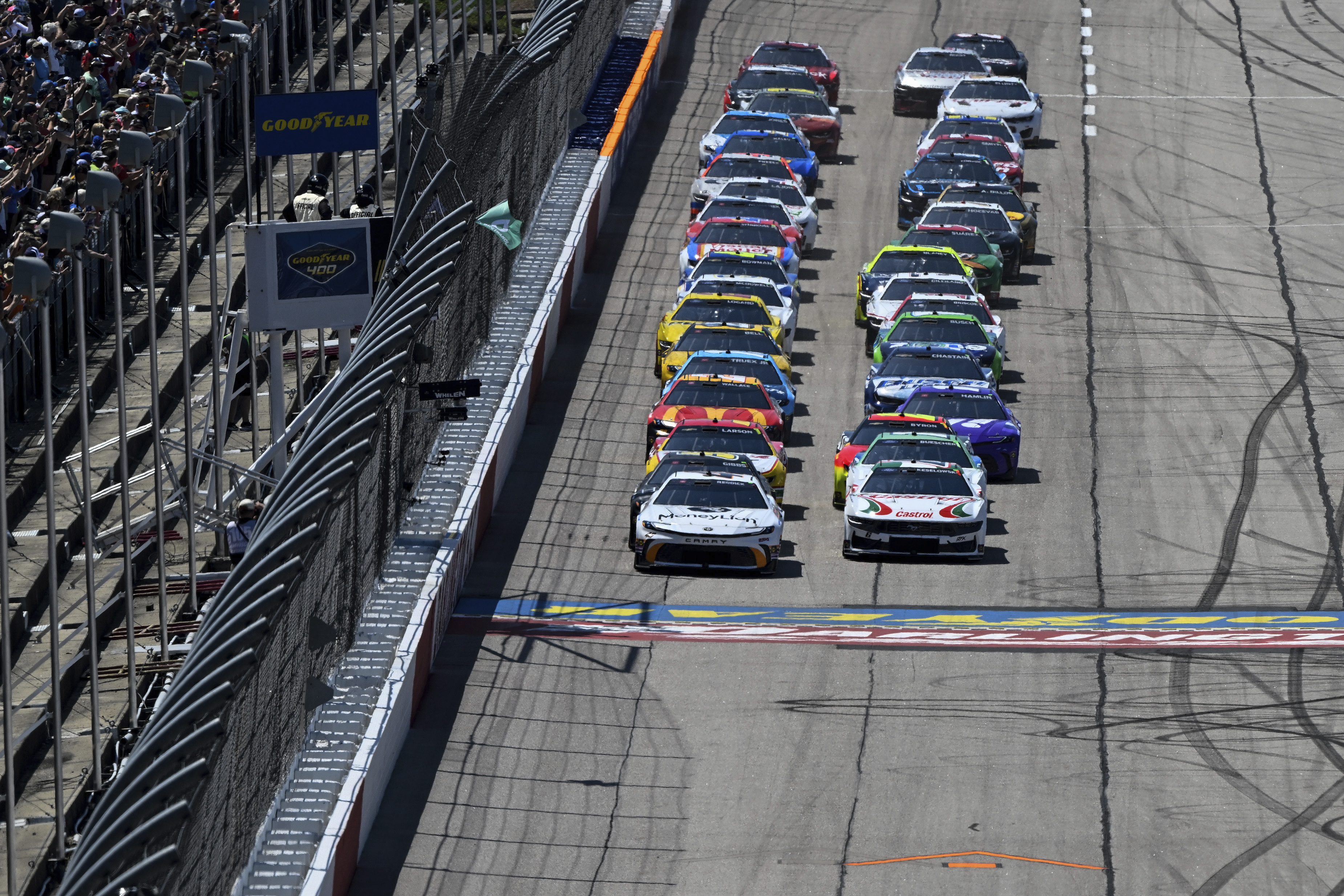 Tyler Reddick (45) leads a pack of cars to the green flag during a NASCAR Cup Series auto race at Darlington Raceway, Sunday, May 12, 2024, in Darlington, S.C. 