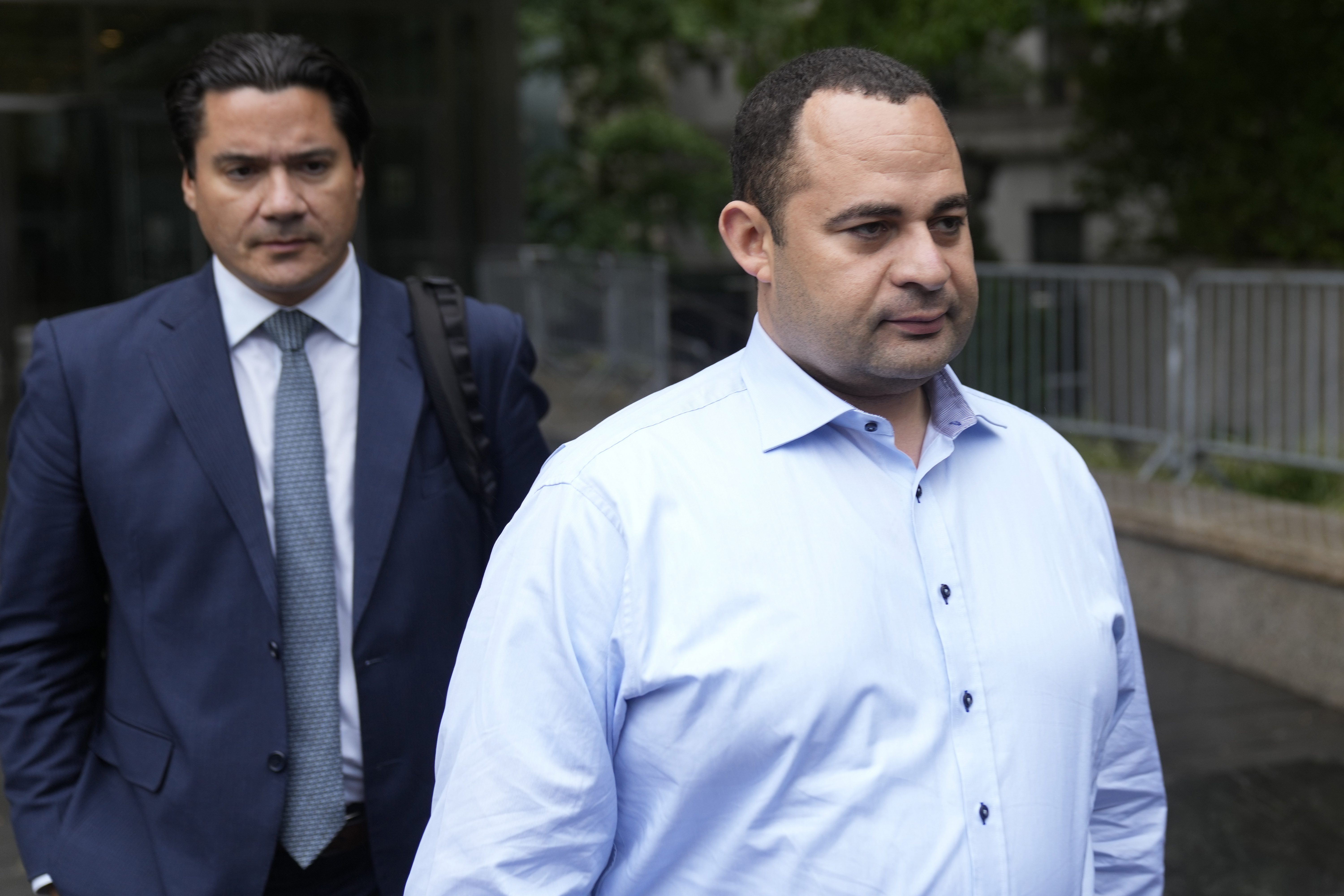Wael Hana, right, leaves the federal courthouse in New York, Sept. 26, 2023. Hana is accused of paying off Sen. Bob Menendez for helping him get a lucrative deal with the Egyptian government to certify that imported meat met Islamic dietary requirements.
