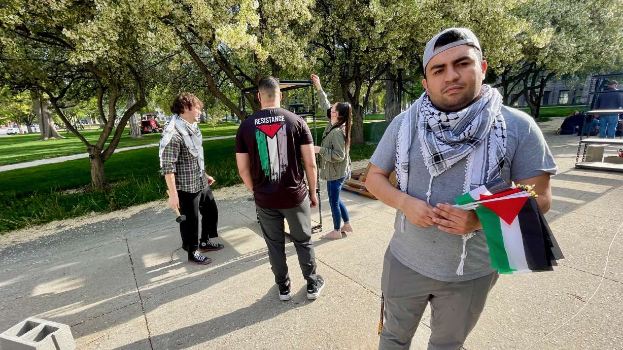 Aziz Abuzayed on the grounds of the Salt Lake City-County Building on April 25 during installation of a memorial to Palestinians killed in the Israel-Hamas war in Gaza.