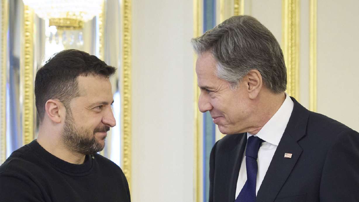 Ukraine's President Volodymyr Zelenskyy, left, greets U.S. Secretary of State Antony Blinken, right, prior to their meeting in Kyiv, Ukraine, Tuesday. Blinken arrived in Kyiv on Tuesday in an unannounced diplomatic mission to reassure Ukraine that it has American support as it struggles to defend against increasingly intense Russian attacks.