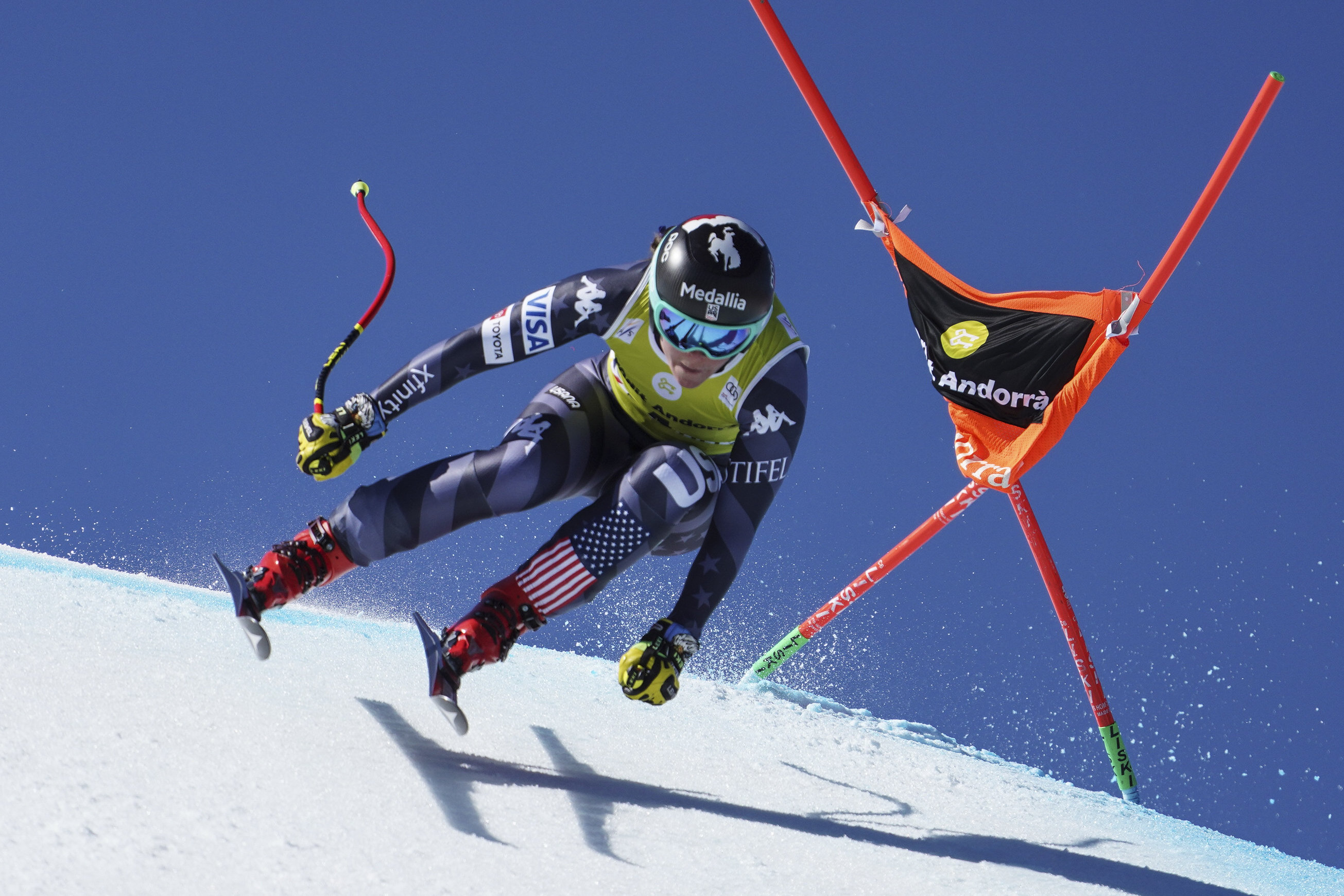 FILE - United States' Breezy Johnson speeds down the course during an alpine ski, women's World Cup downhill in Soldeu, Andorra, on March 15, 2023. Downhill skier Breezy Johnson has been banned for 14 months for three violations of anti-doping rules and can return to race in December. The U.S. Anti-Doping Agency has published its decision for Johnson’s failure to comply with so-called “whereabouts” rules. 