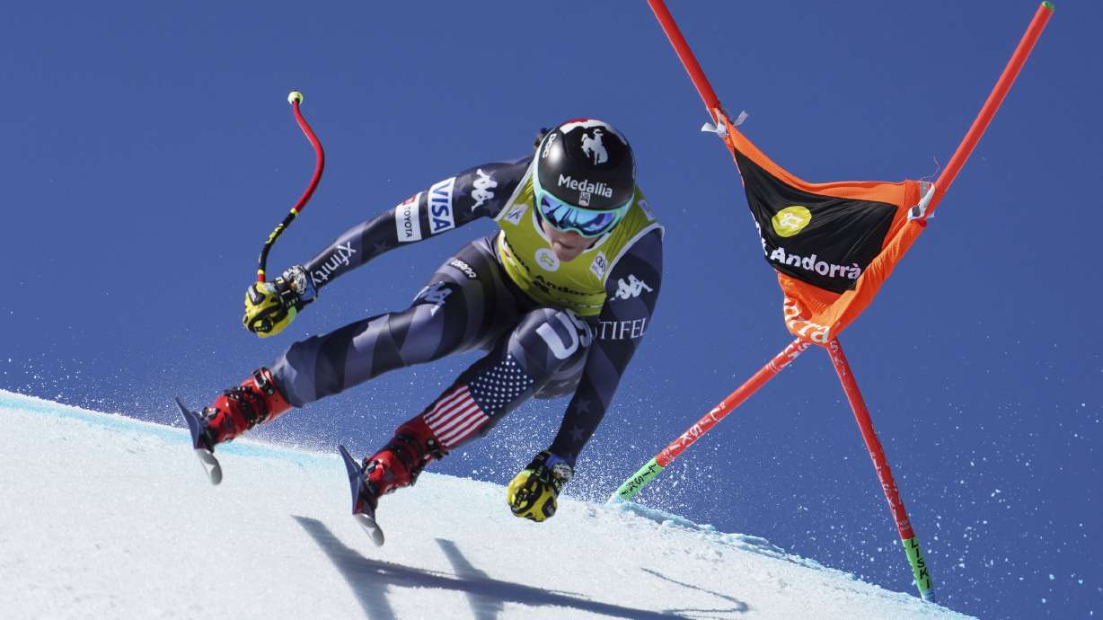 FILE - United States' Breezy Johnson speeds down the course during an alpine ski, women's World Cup downhill in Soldeu, Andorra, on March 15, 2023. Downhill skier Breezy Johnson has been banned for 14 months for three violations of anti-doping rules and can return to race in December. The U.S. Anti-Doping Agency has published its decision for Johnson’s failure to comply with so-called “whereabouts” rules.