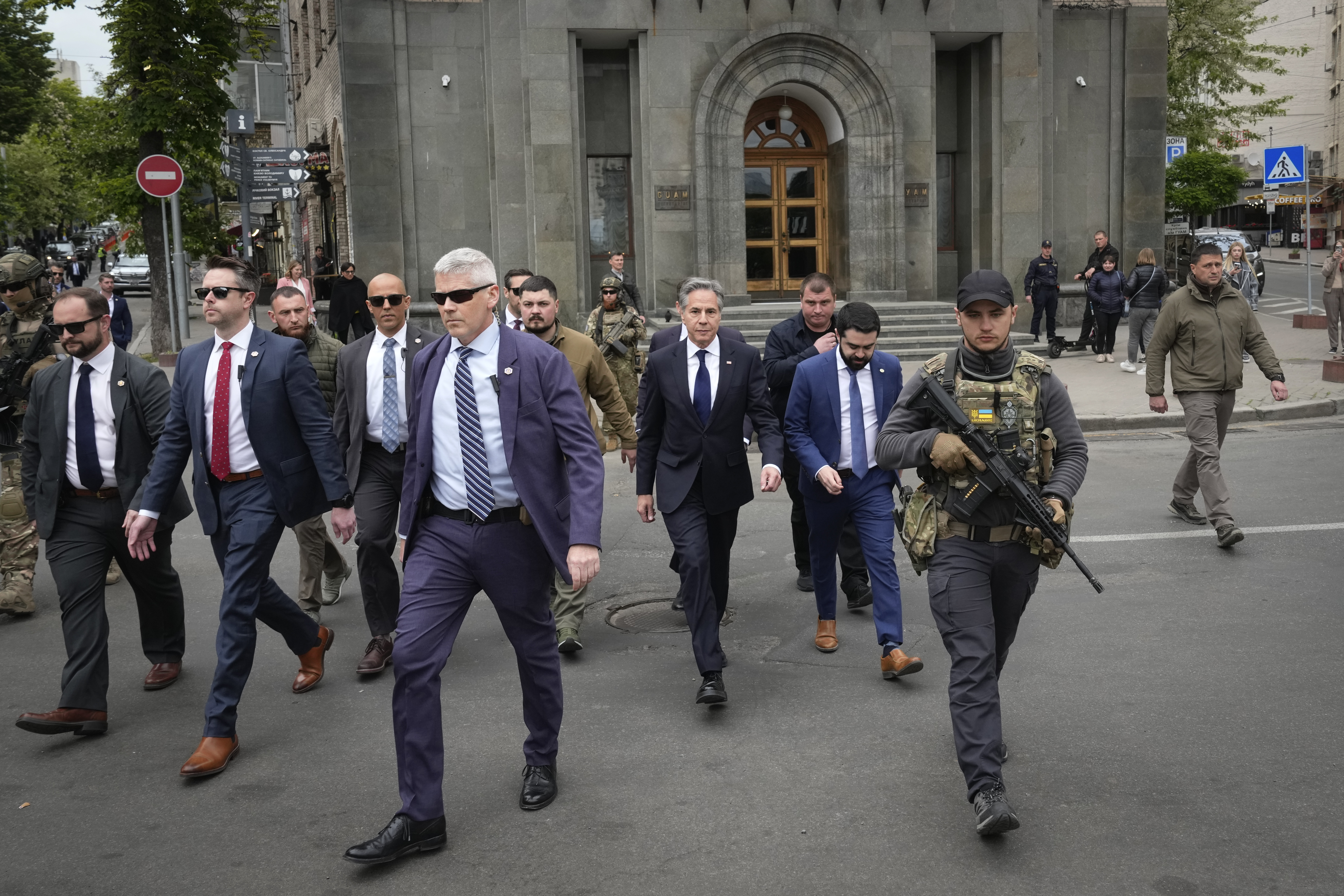 U.S. Secretary of State Antony Blinken, center, surrounded by security officers, walks in Independence Square in Kyiv, Ukraine, Tuesday. Blinken arrived in Kyiv on Tuesday in an unannounced diplomatic mission to reassure Ukraine that it has American support.