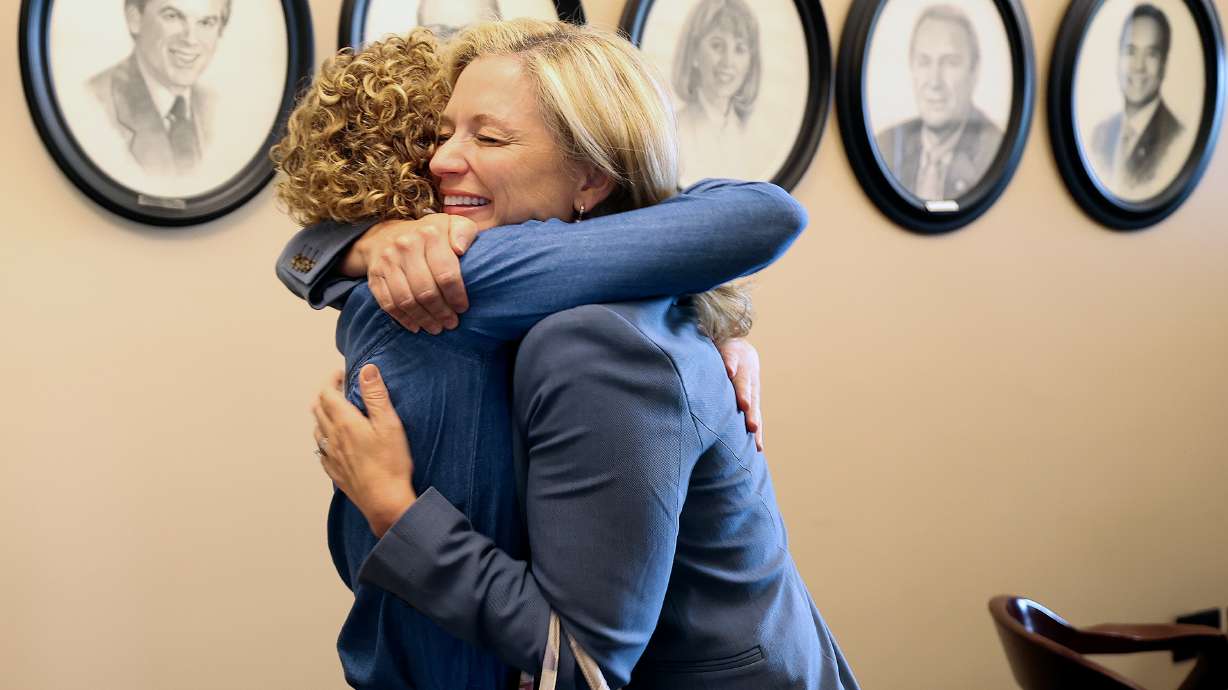Utah Opioid Task Force director Natalie Boren hugs Melissa Holyoak, commissioner at the Federal Trade Commission, as they run into each other in the attorney general’s office at the Capitol in Salt Lake City on May 3.