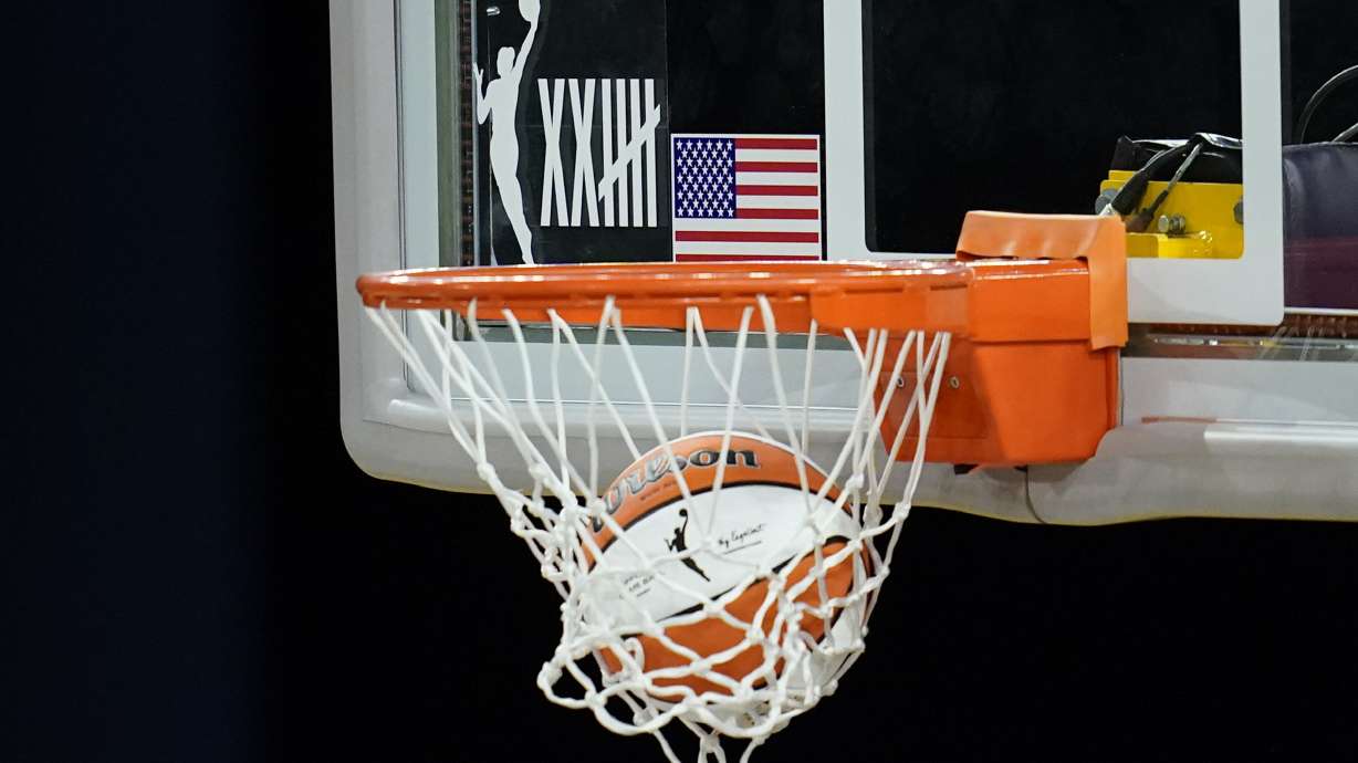 FILE - A logo on the backboard marks the 25th anniversary of the WNBA as the Los Angeles Sparks warm up before a WBNA basketball game against the Dallas Wings Friday, May 14, 2021, in Los Angeles. The WNBA franchise that's affiliated with the Golden State Warriors, the Golden State Valkyries, unveiled the team's brand identity, Tuesday, May 14, 2024, with the name and logo.