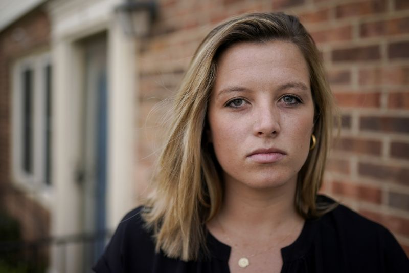 Shannon Keeler poses for a portrait in the United States, April 7, 2021. An American accused of sexually assaulting Keeler at a Pennsylvania college in 2013 and later sending her a Facebook message that said, “So I raped you,” has been detained in France after a three-year search.