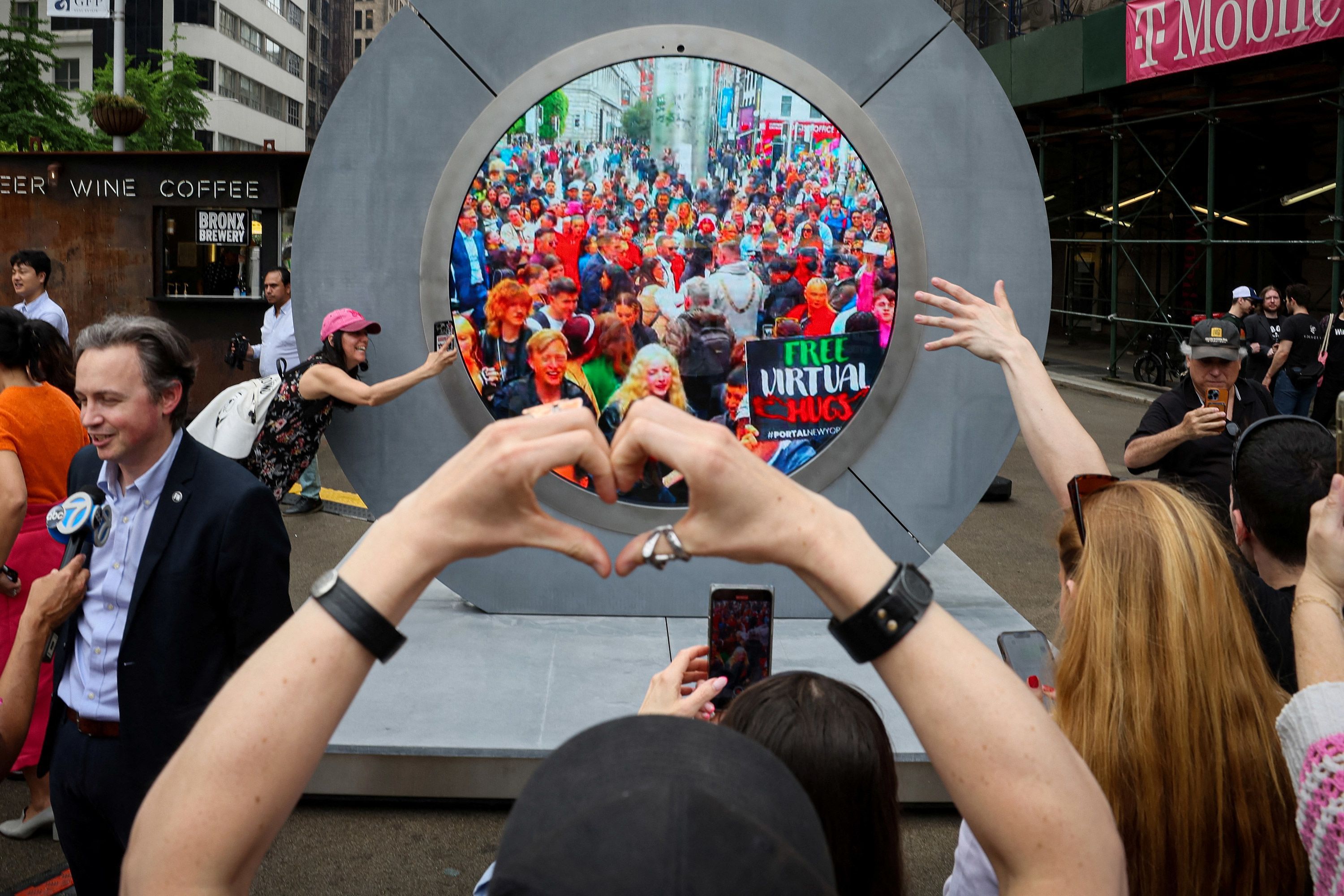 The reveal of New York City's Portal on May 8. Less than a week after two public sculptures featuring a livestream between Dublin, Ireland, and New York City debuted, "inappropriate behavior" between people in the cities prompted a shutdown.