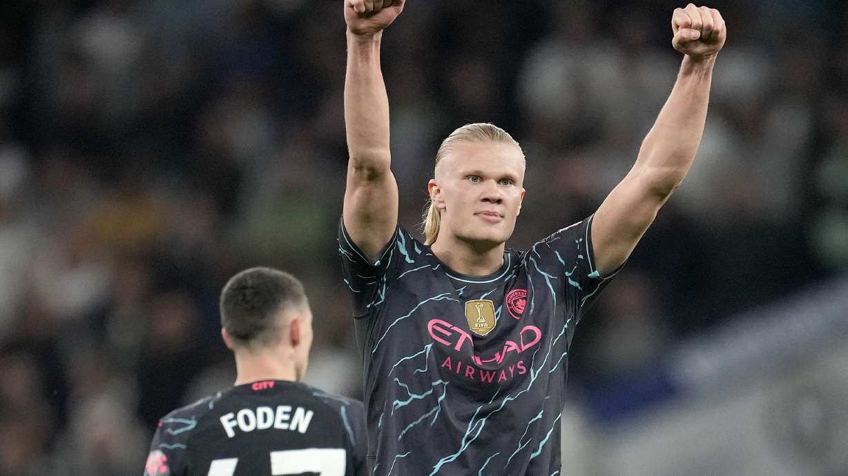 Manchester City's Erling Haaland celebrates scoring his side's first goal during the English Premier League soccer match between Tottenham Hotspur and Manchester City at Tottenham Hotspur Stadium in London, Tuesday, May 14, 2024.