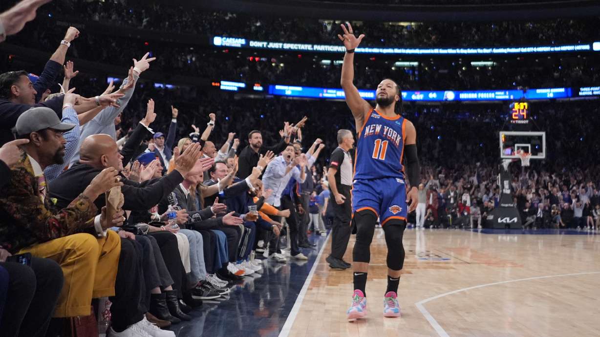 New York Knicks' Jalen Brunson (11) gestures to fans after making a three-point shot during the second half of Game 5 in an NBA basketball second-round playoff series against the Indiana Pacers, Tuesday, May 14, 2024, in New York. The Knicks won 121-91.