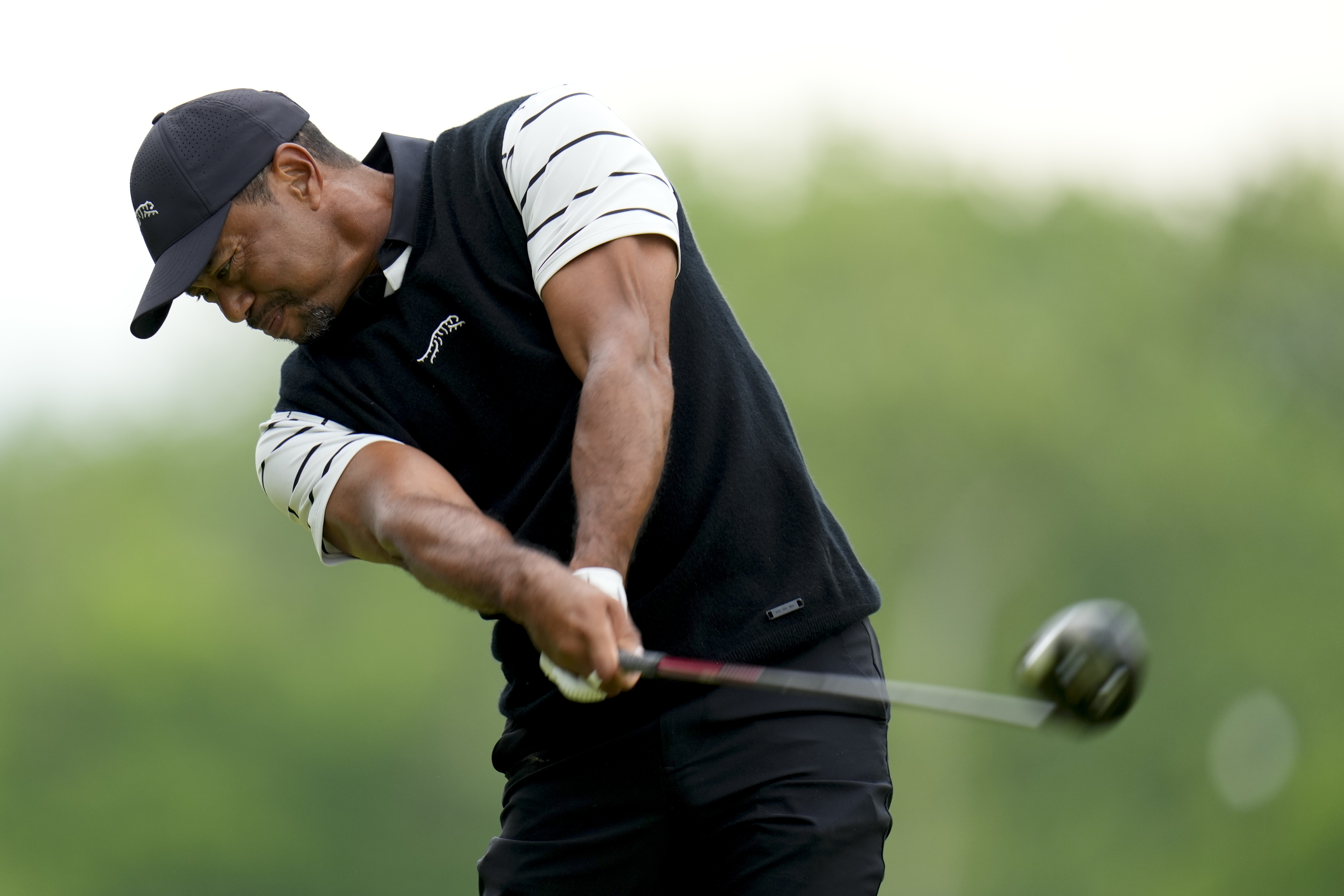 Tiger Woods hits his tee shot on the fifth hole during a practice round for the PGA Championship golf tournament at the Valhalla Golf Club, Tuesday, May 14, 2024, in Louisville, Ky. 