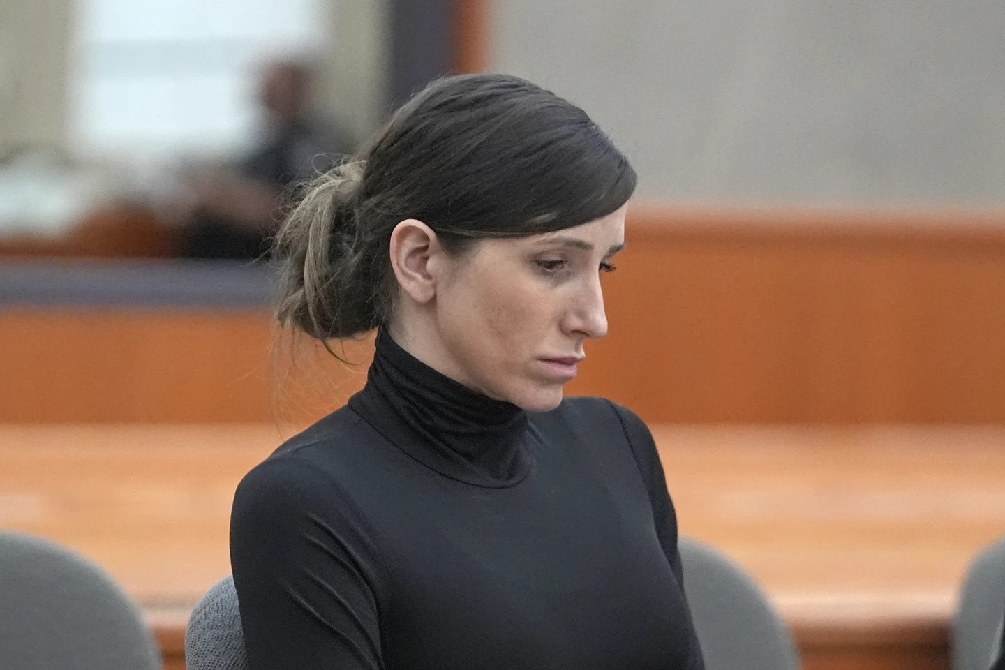 Kouri Richins attends a hearing in Park City. Prosecutors say a recent about-face by a man accused of providing fentanyl that killed Richins' husband is not credible. And they argue there's still plenty of evidence to convict her in the murder case.