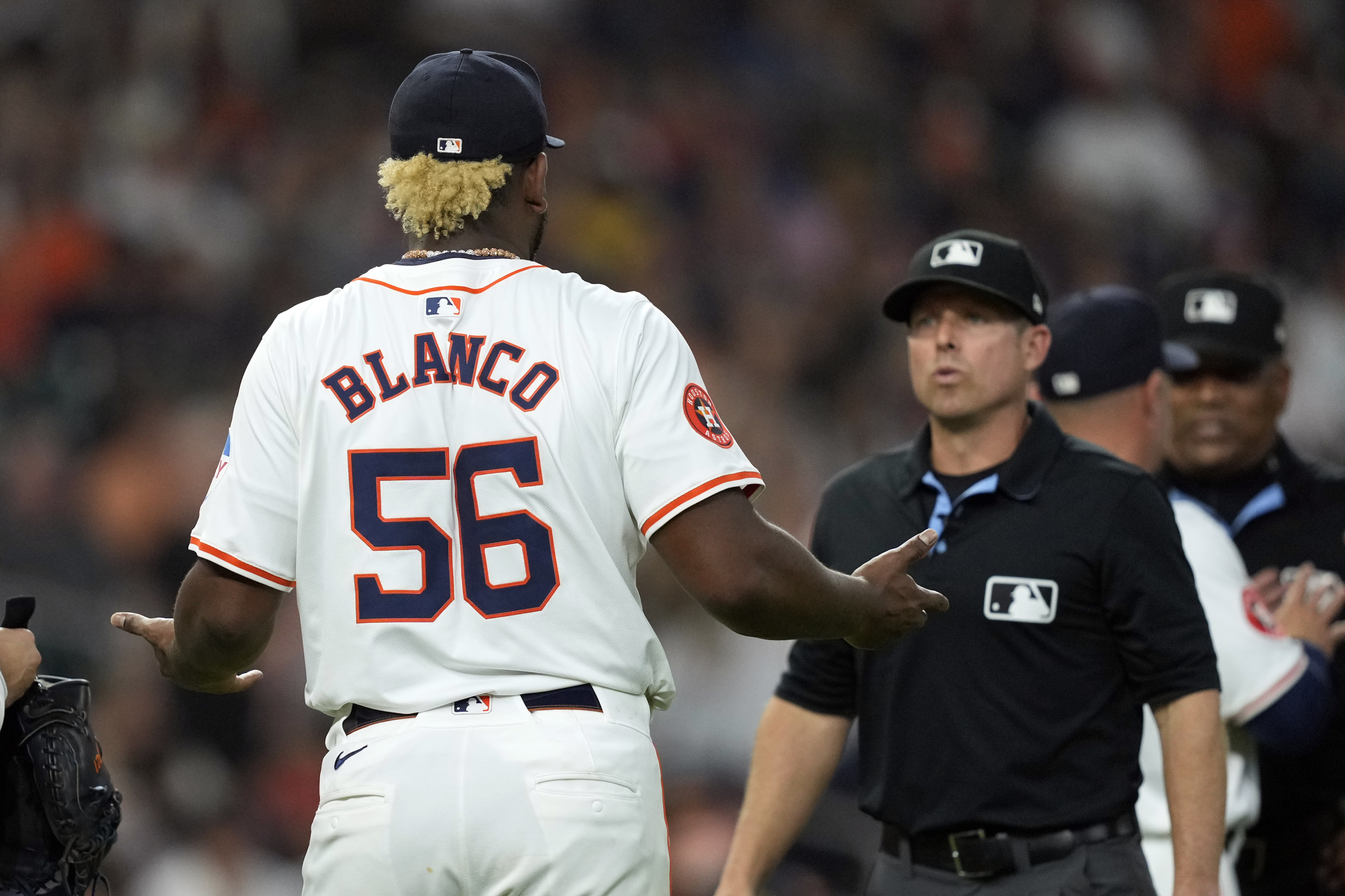 Houston Astros starting pitcher Ronel Blanco (56) talks with second base umpire Tripp Gibson after being ejected following a foreign substance check during the fourth inning of a baseball game against the Oakland Athletics Tuesday, May 14, 2024, in Houston.