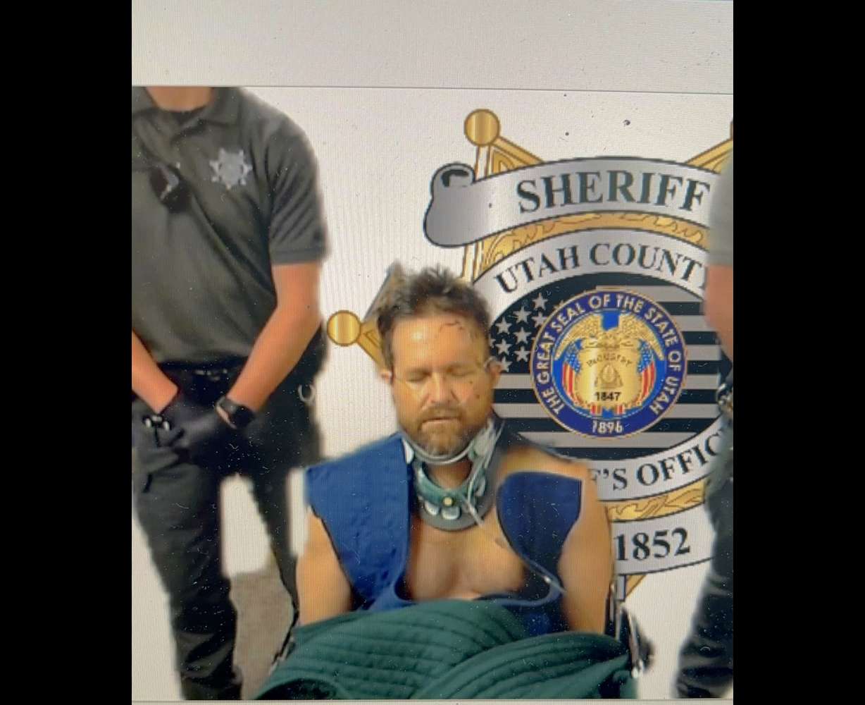 Michael Aaron Jayne appears in 4th District Court from a wheelchair on Wednesday, May 15, on charges of killing a Santaquin police sergeant.